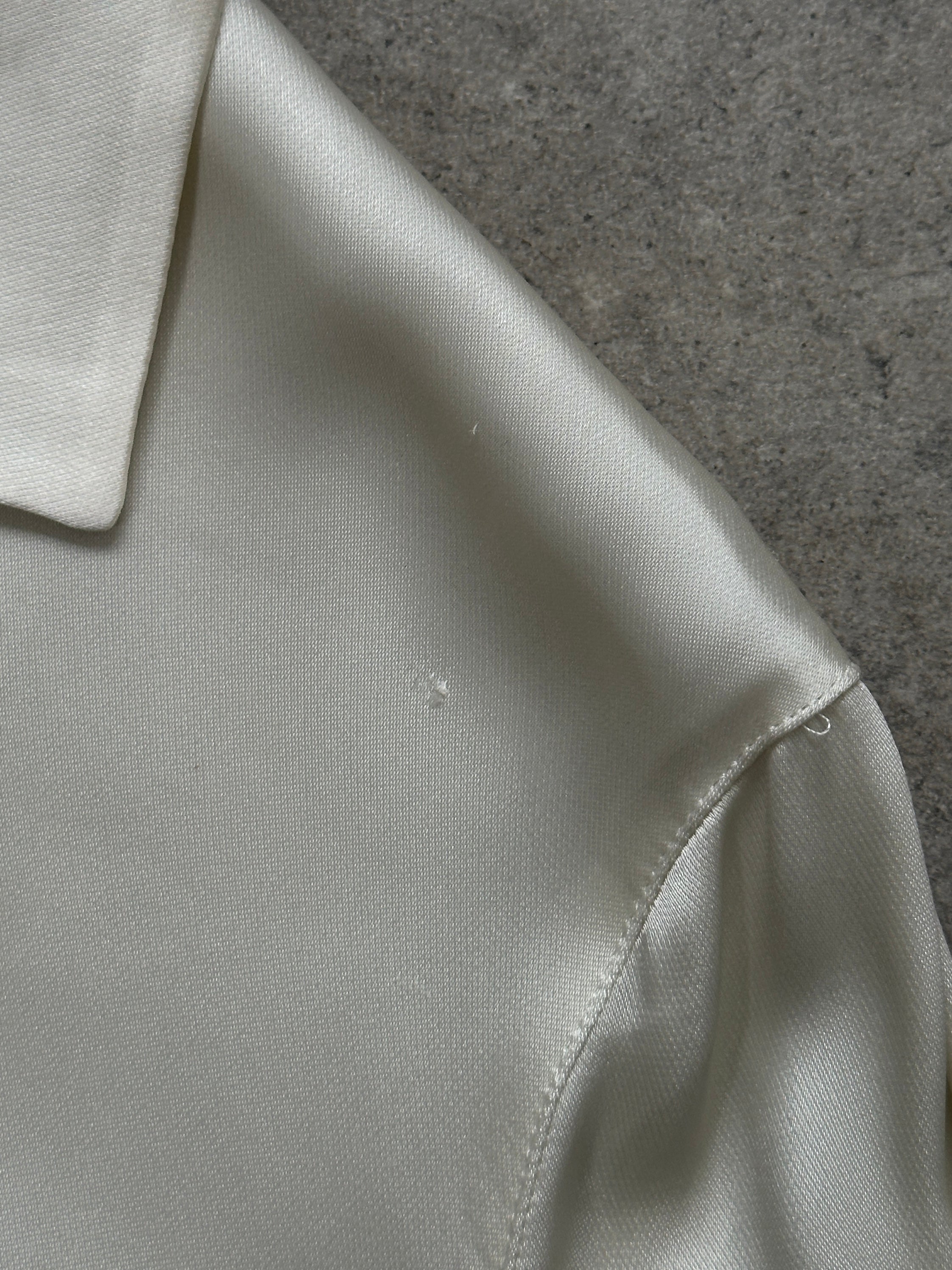 Mani 1990s cropped dress shirt in size small, featuring a classic button-up design with a fitted silhouette.