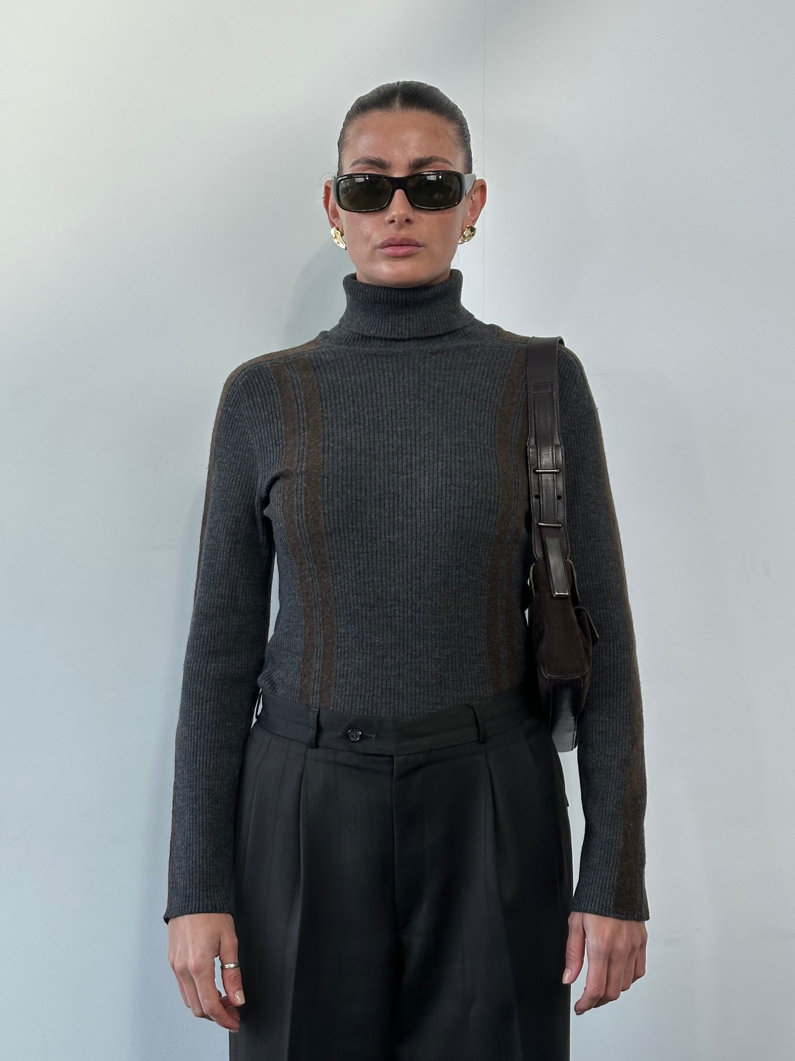 Dolce & Gabbana wool rib-knit turtle neck jumper in black, featuring a snug fit and classic design.