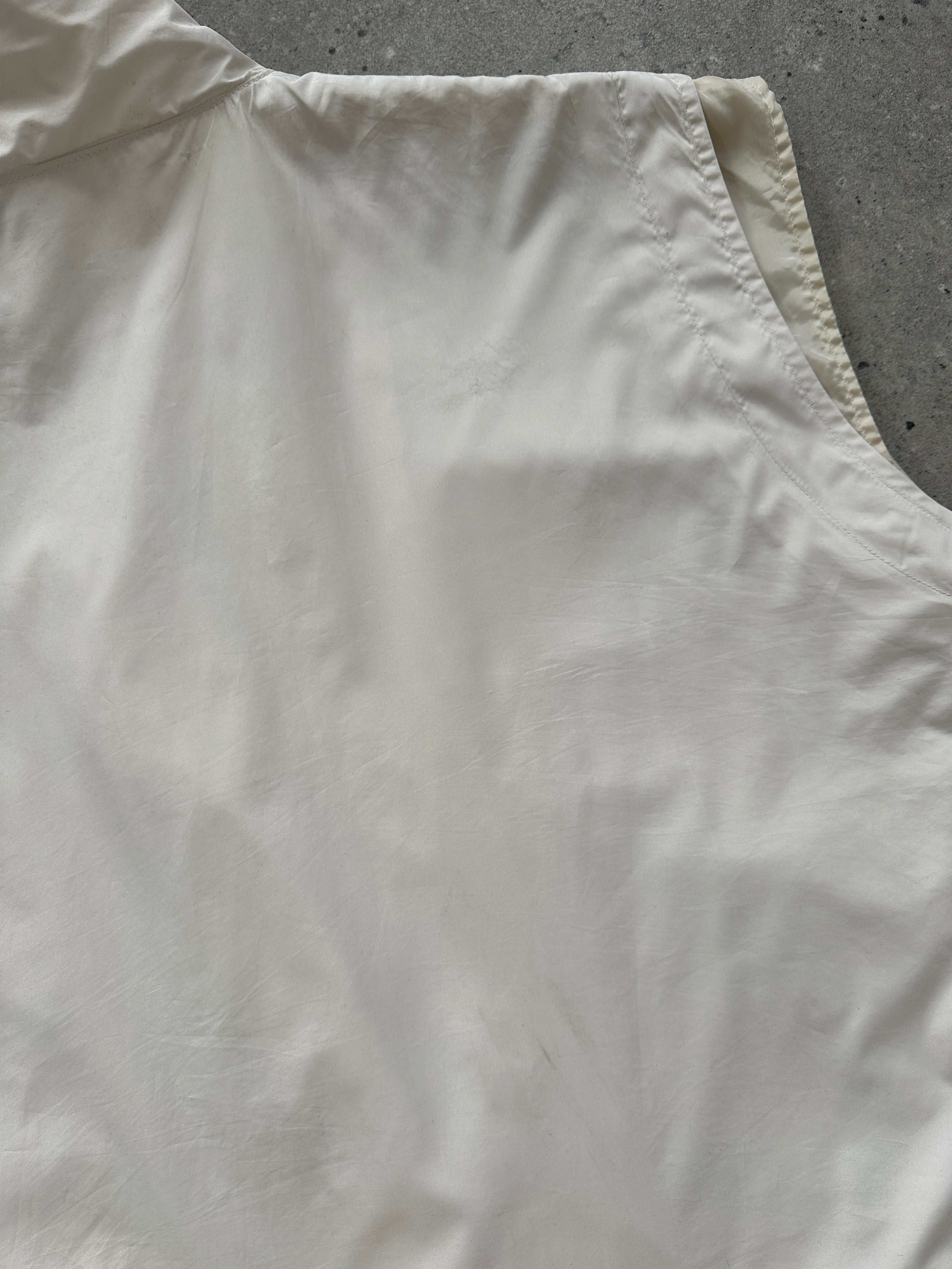 Prada sleeveless nylon vest with double zipper closure, lightweight gilet jacket in XL size displayed on a hanger.
