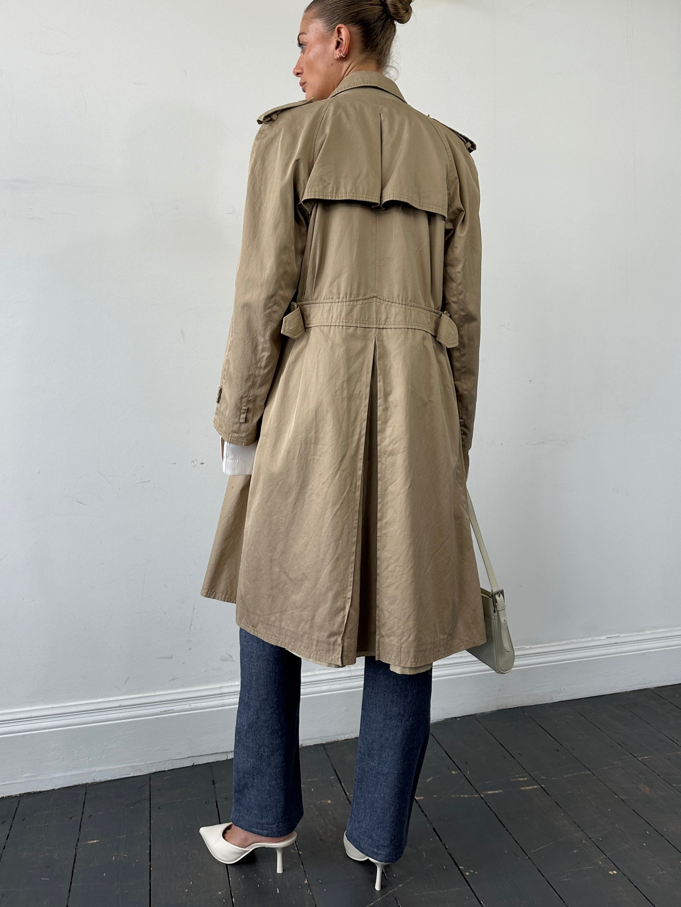 Yves Saint Laurent pure cotton double-breasted trench coat in size M, classic beige with tailored silhouette and button details.