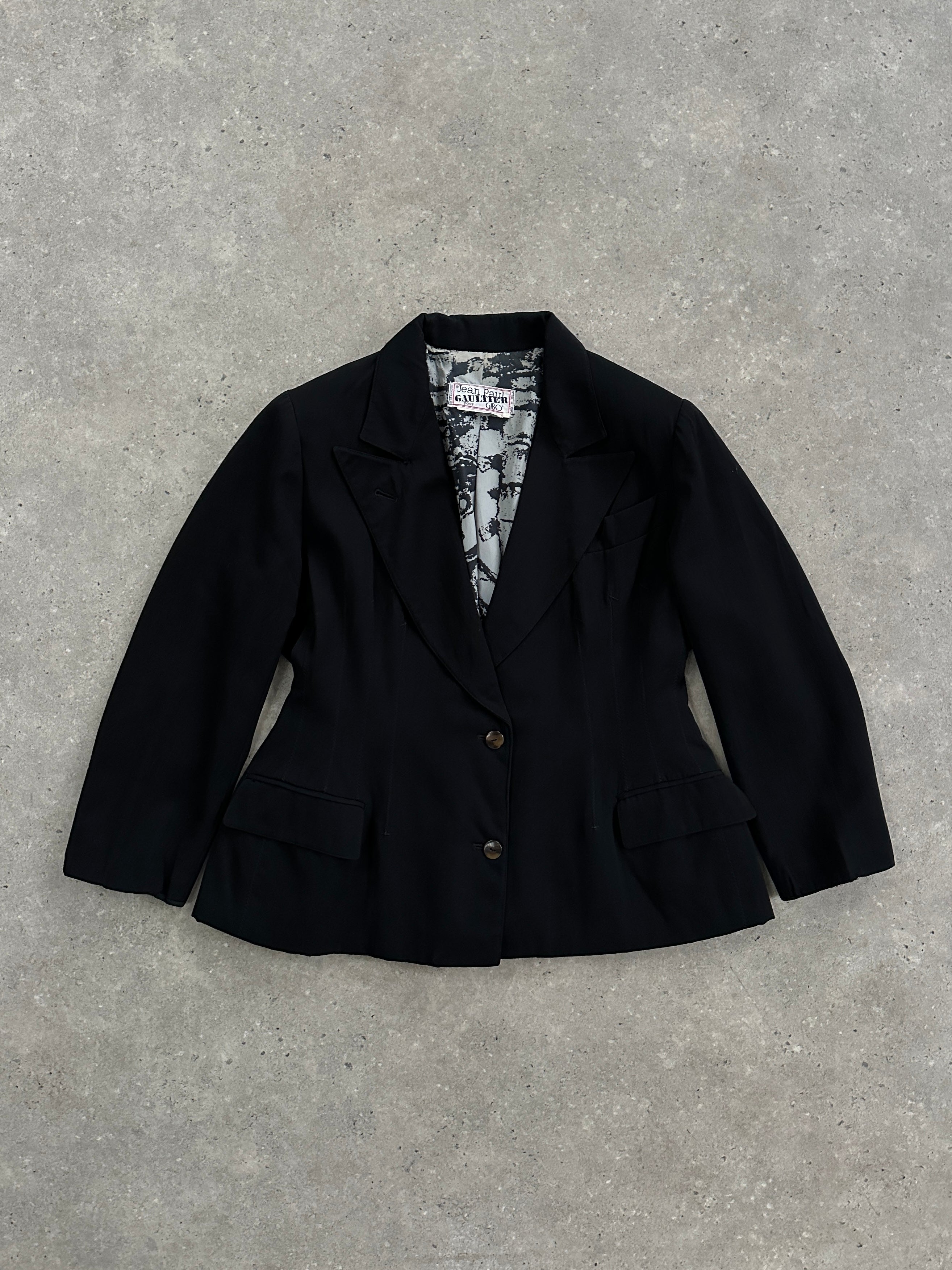 Jean Paul Gaultier 80s wool blazer with a fitted waist, featuring classic tailoring and a structured silhouette.