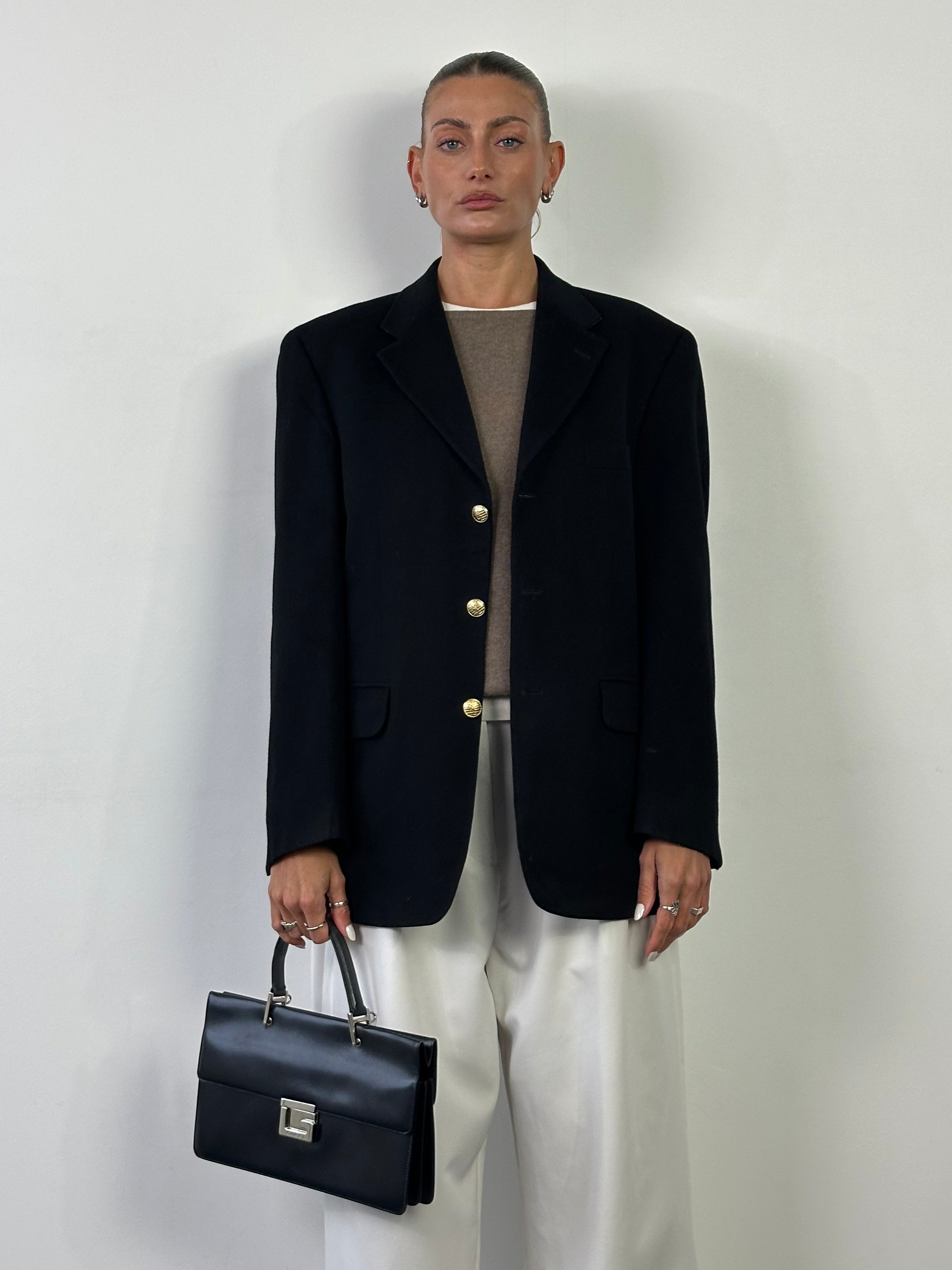 Gucci 1990s Tom Ford Square G leather handbag with structured shape and gold-tone hardware, featuring iconic design details.