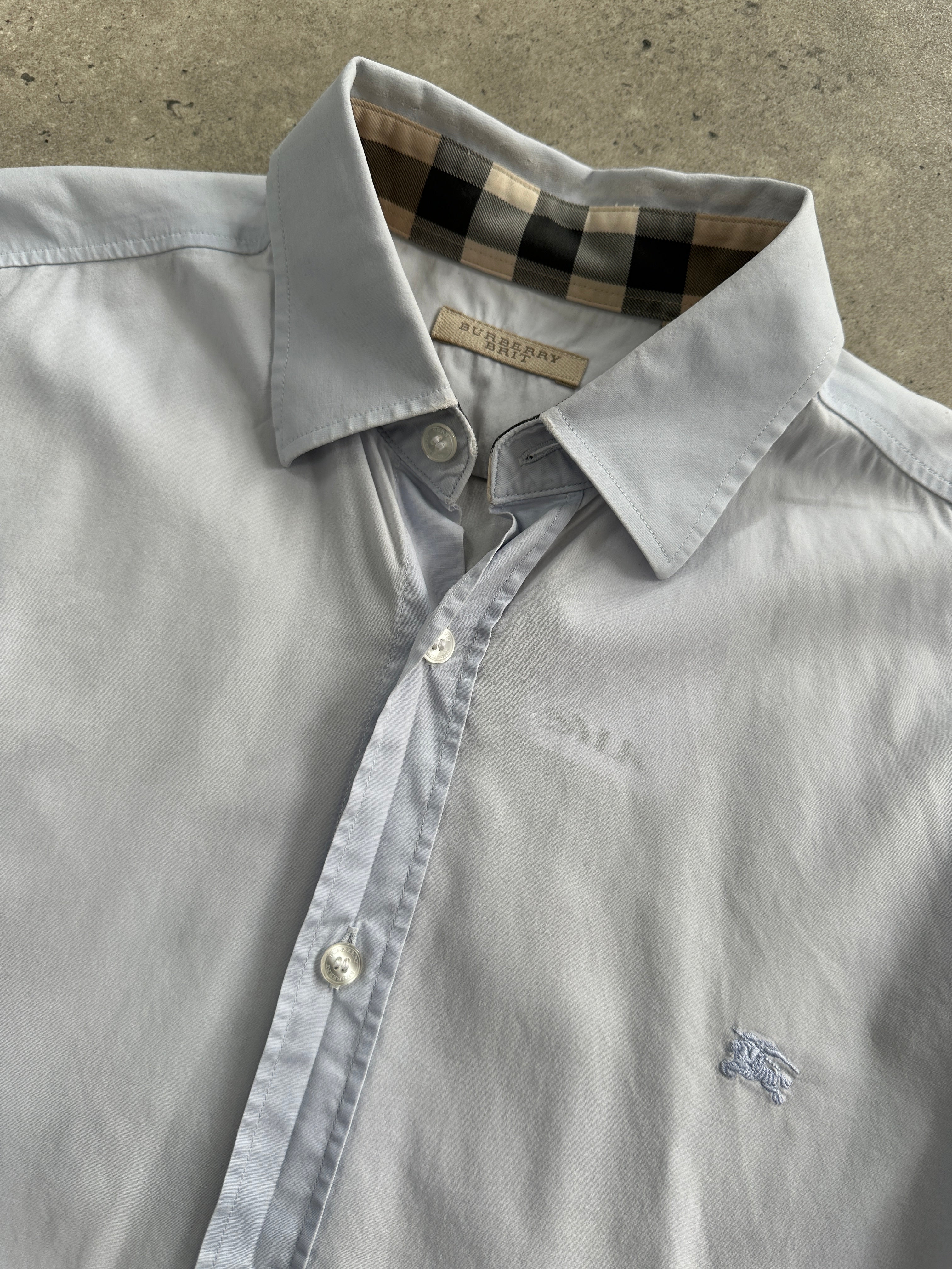 Burberry Brit cotton logo shirt in size M, featuring the classic Burberry branding and a sleek, tailored fit.