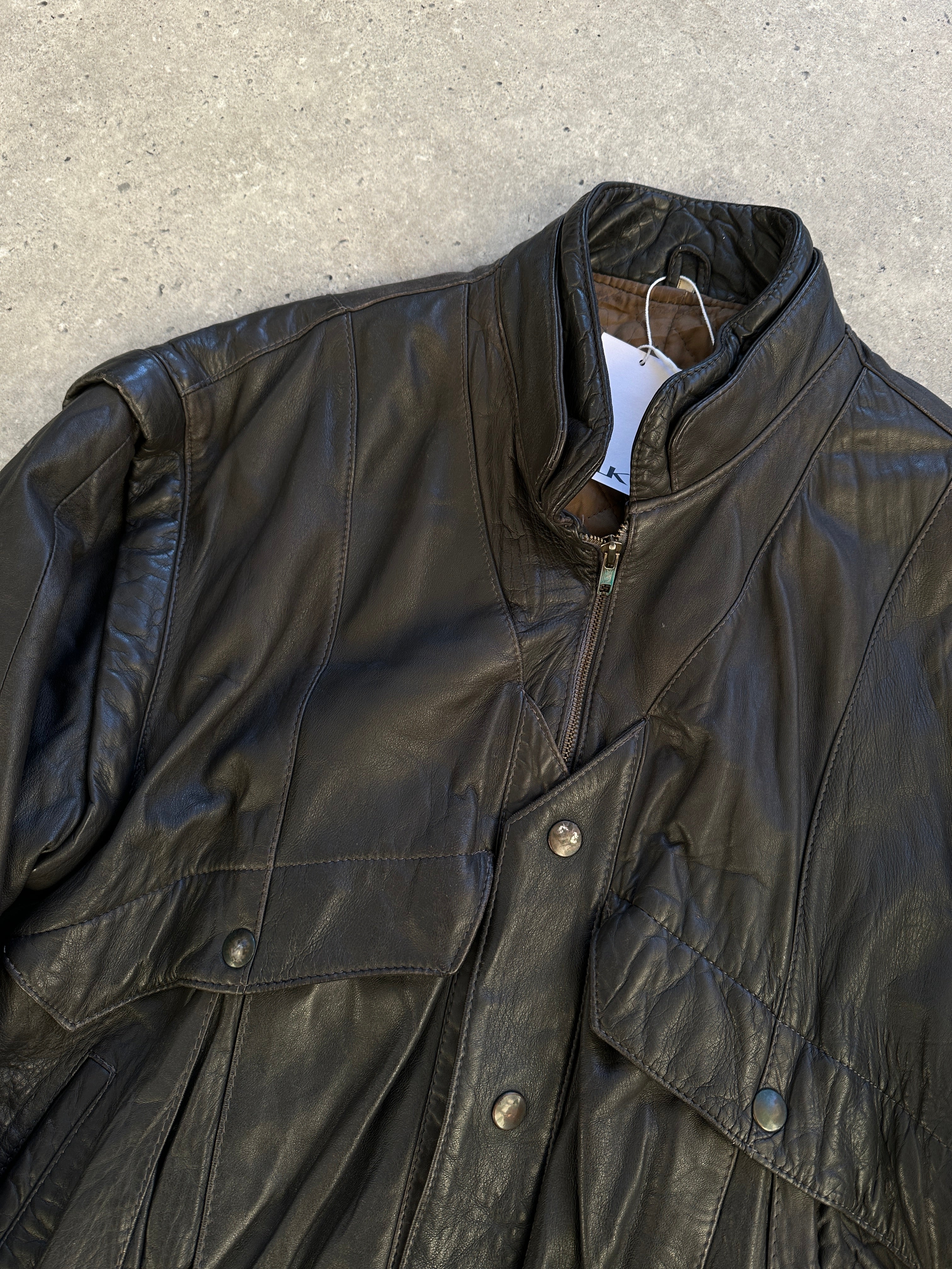 Vintage Leather Bomber Gilet Jacket in size M, featuring classic design with a smooth leather finish and stylish collar detail.