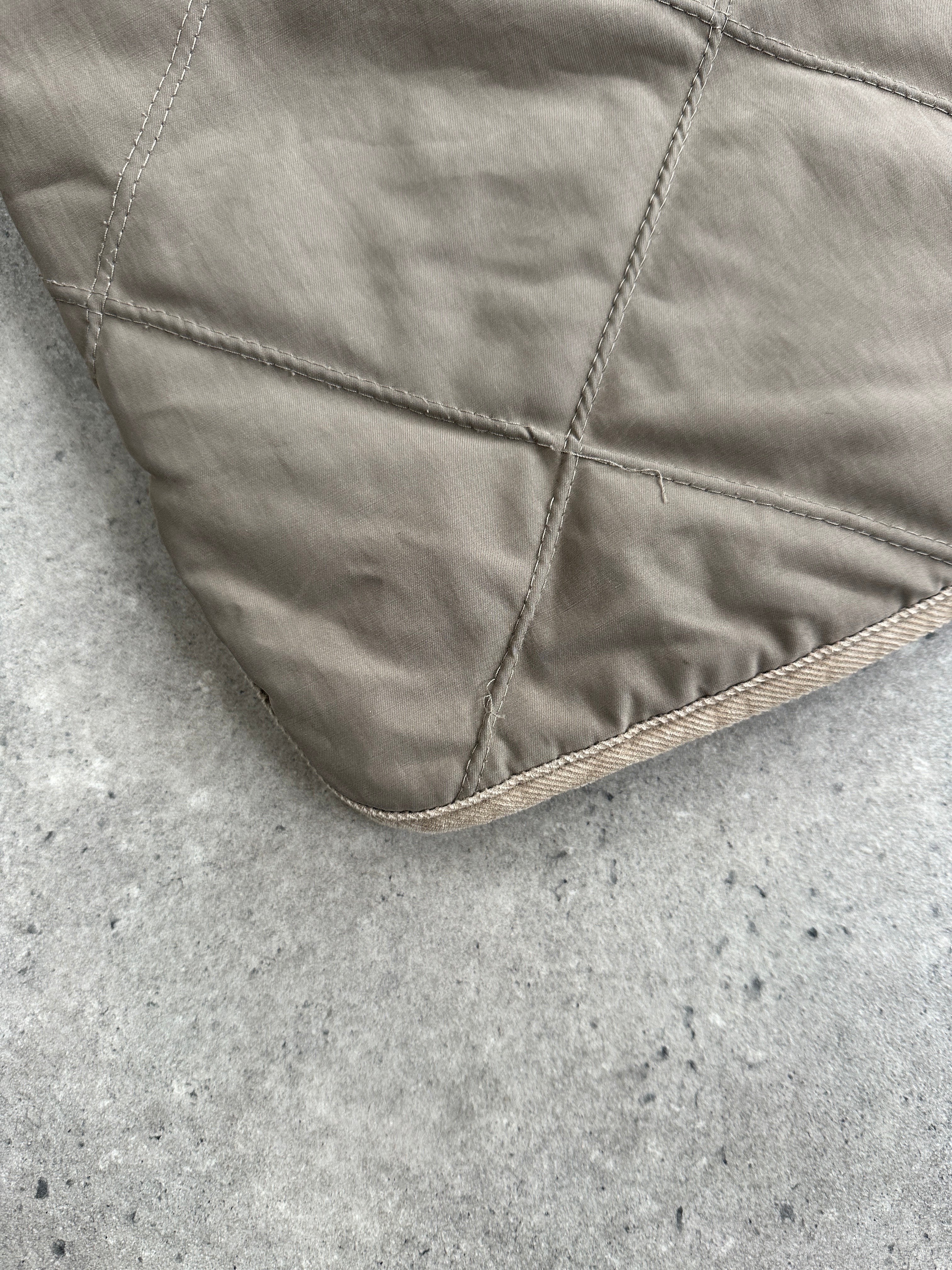 Burberry 1990s quilted Nova Check coat with cord collar, featuring classic pattern and tailored design in size L.
