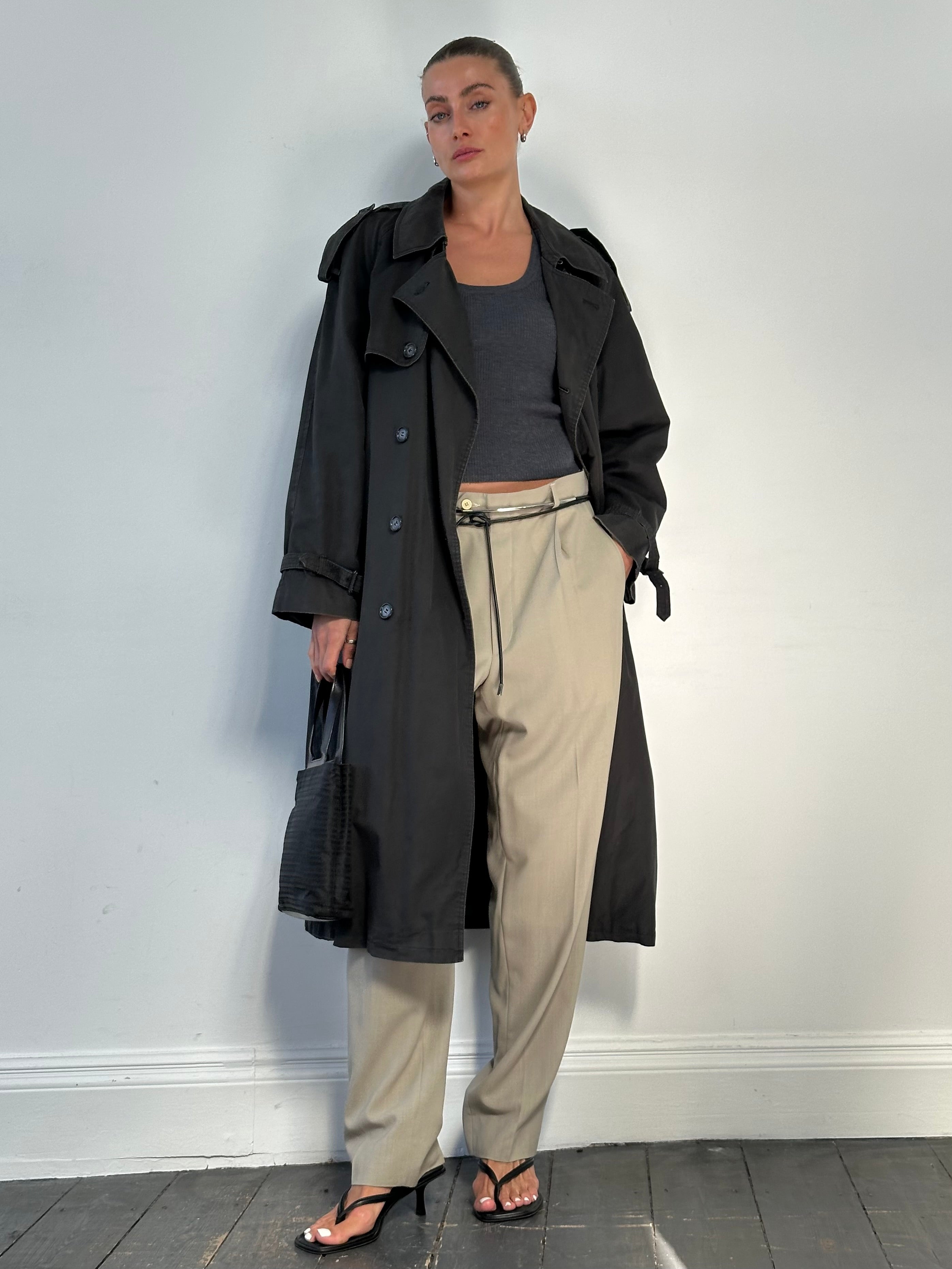 Vintage wool high-waisted straight leg trousers in neutral color, front view showing classic tailored fit and vintage style.