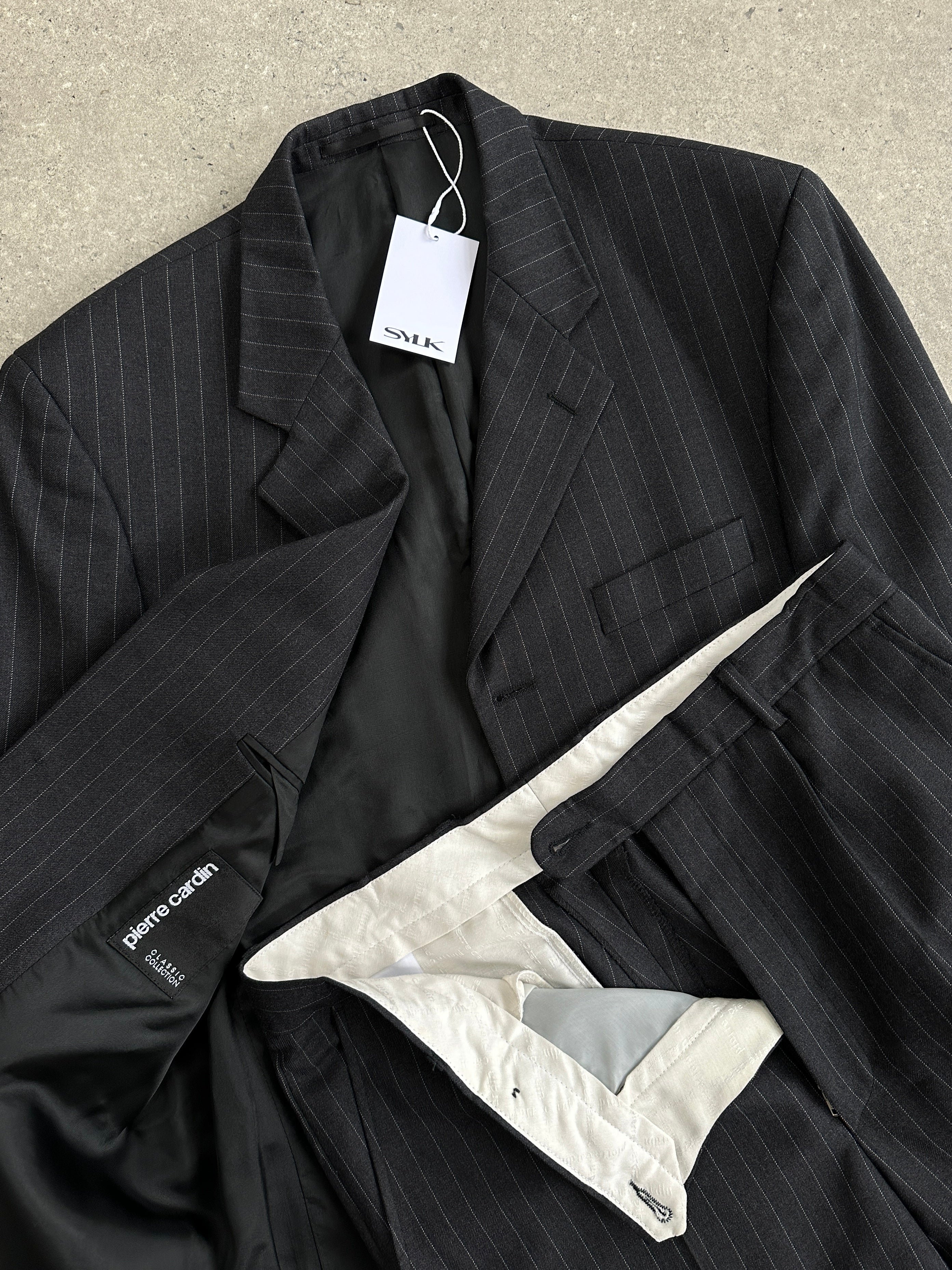 Pierre Cardin pinstripe pure wool single-breasted suit jumpsuit in size 40R/W32, featuring tailored lapels and front pockets.