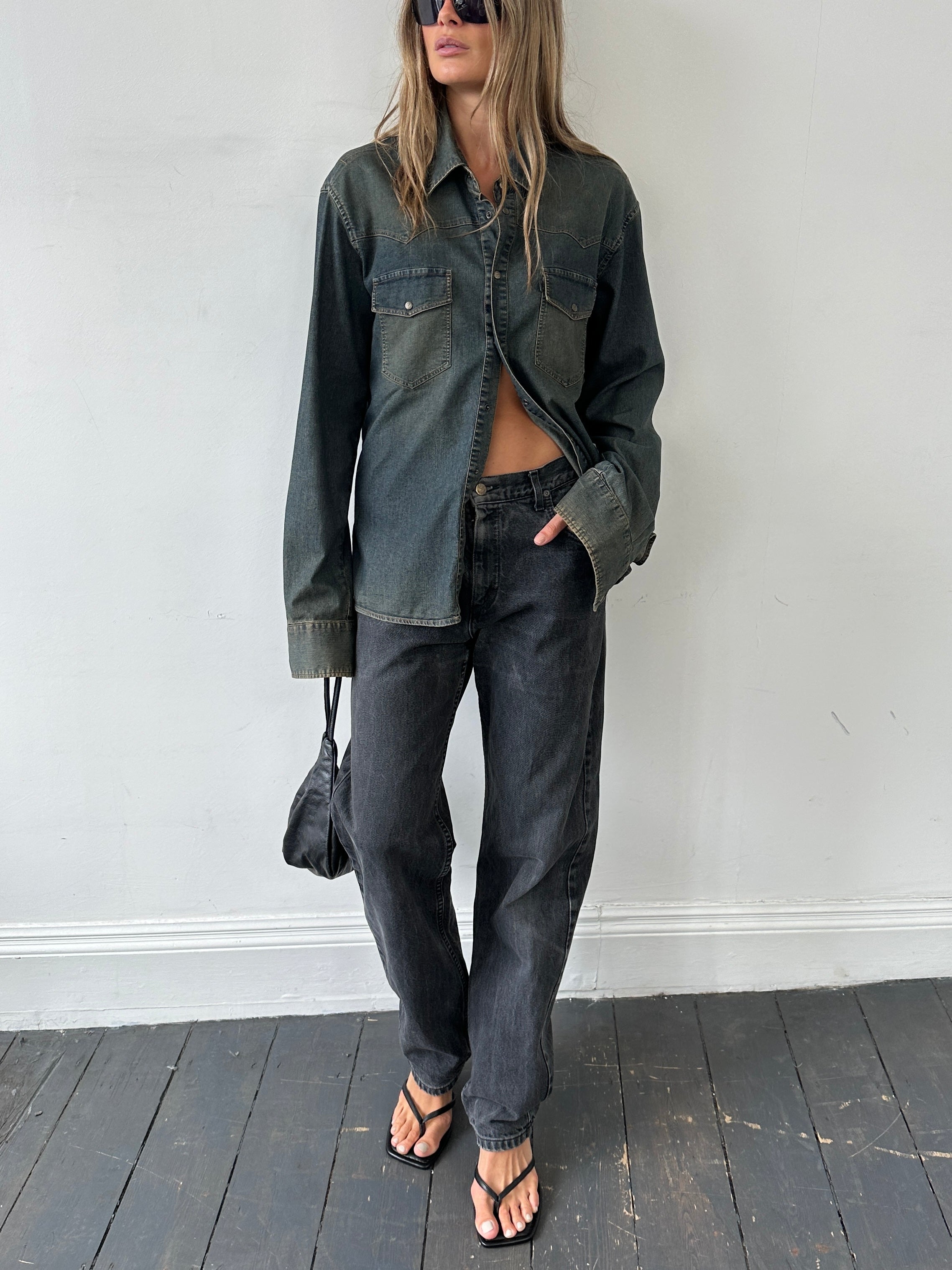 Lee high waisted straight leg denim jeans in W32 displayed, showcasing classic fit and durable blue denim fabric.