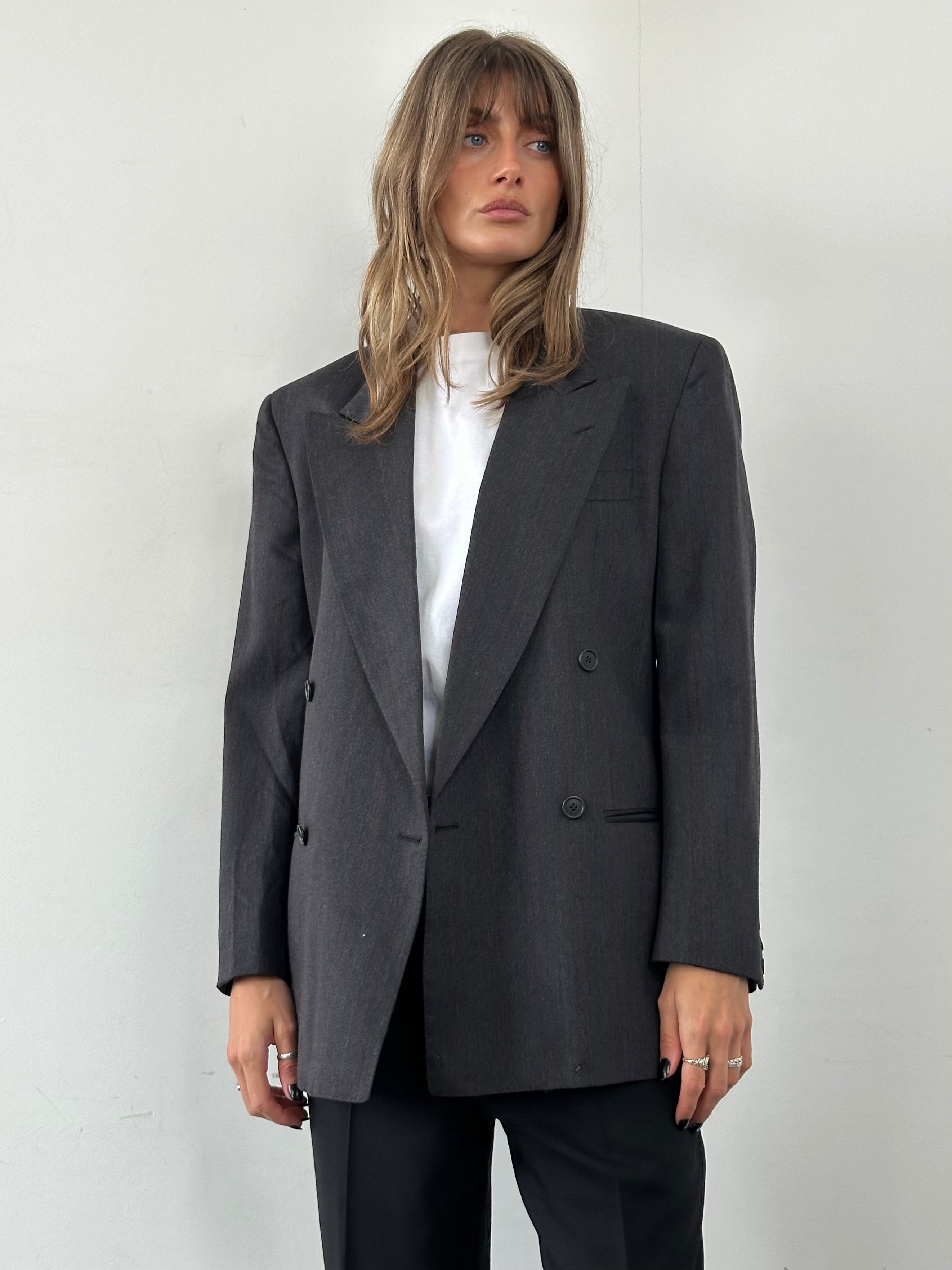 Valentino virgin wool double-breasted blazer in navy, size 36R/S, tailored fit with classic lapels and button details.