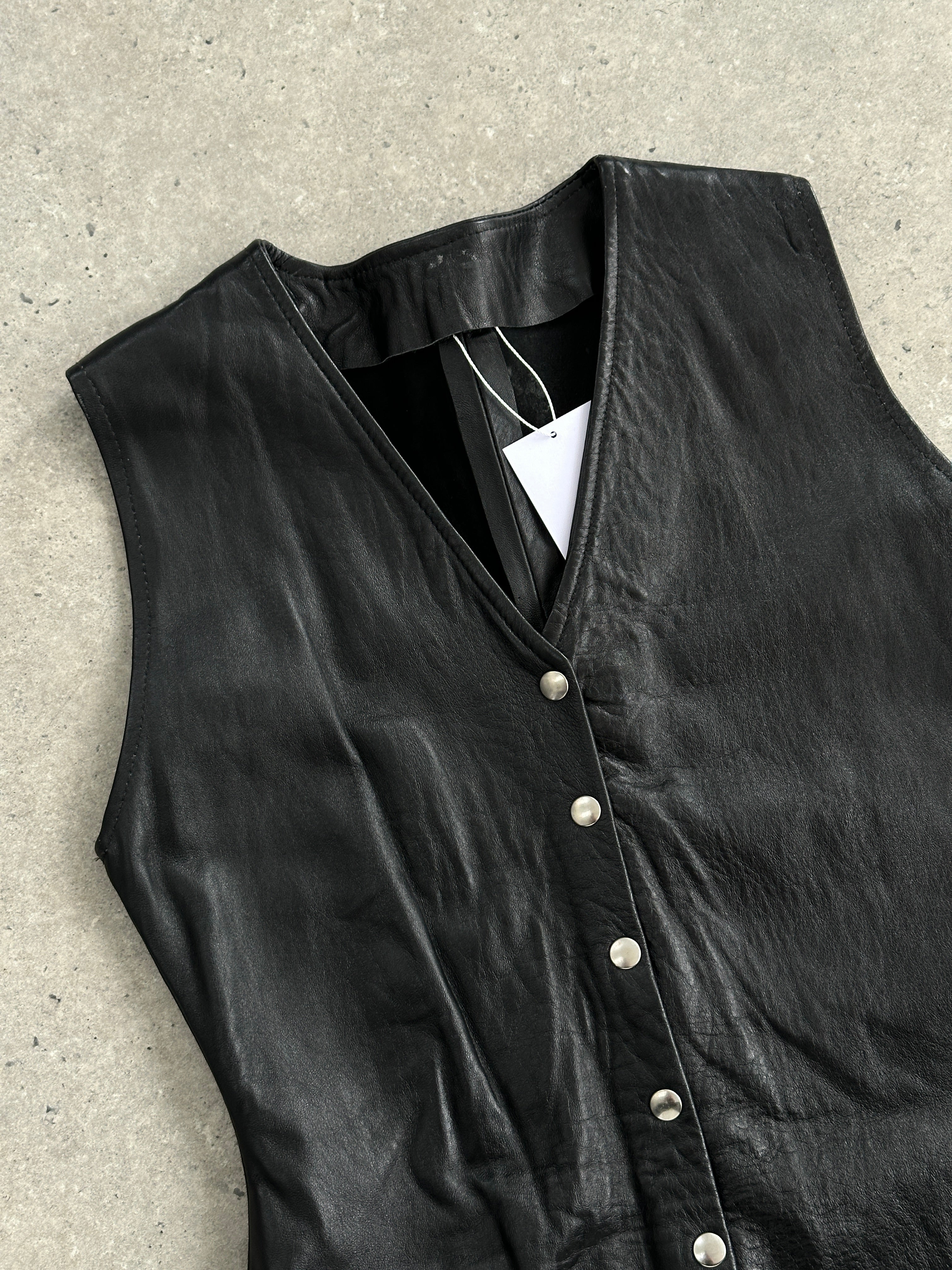 Vintage fitted leather button-up dress in size small, featuring a classic collar and tailored silhouette.