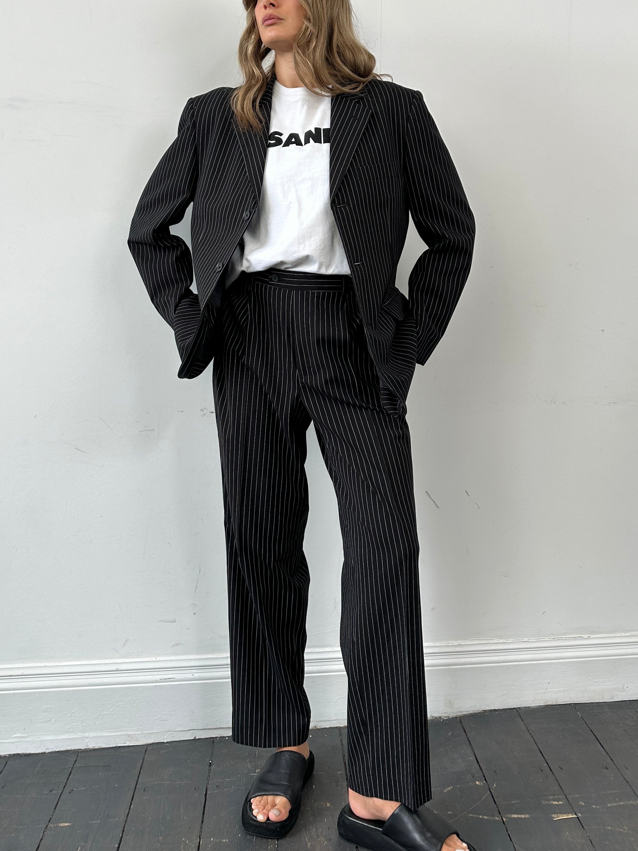 Vintage pinstripe single-breasted jumpsuit in size 40R/W36, featuring classic tailored design and vintage fabric details.