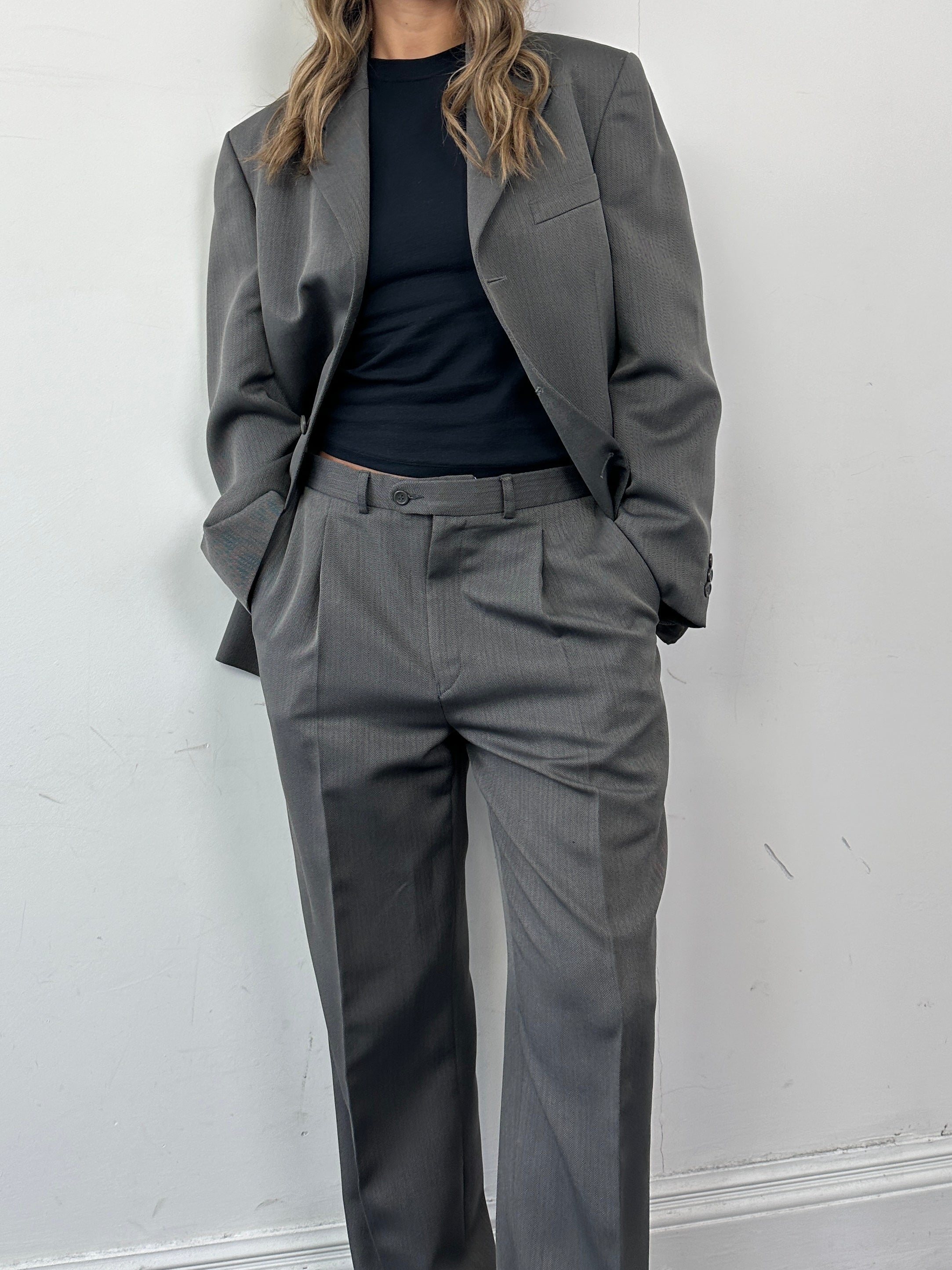 Vintage herringbone single-breasted suit jumpsuit in size 38R/W32, showcasing tailored fit and classic pattern.