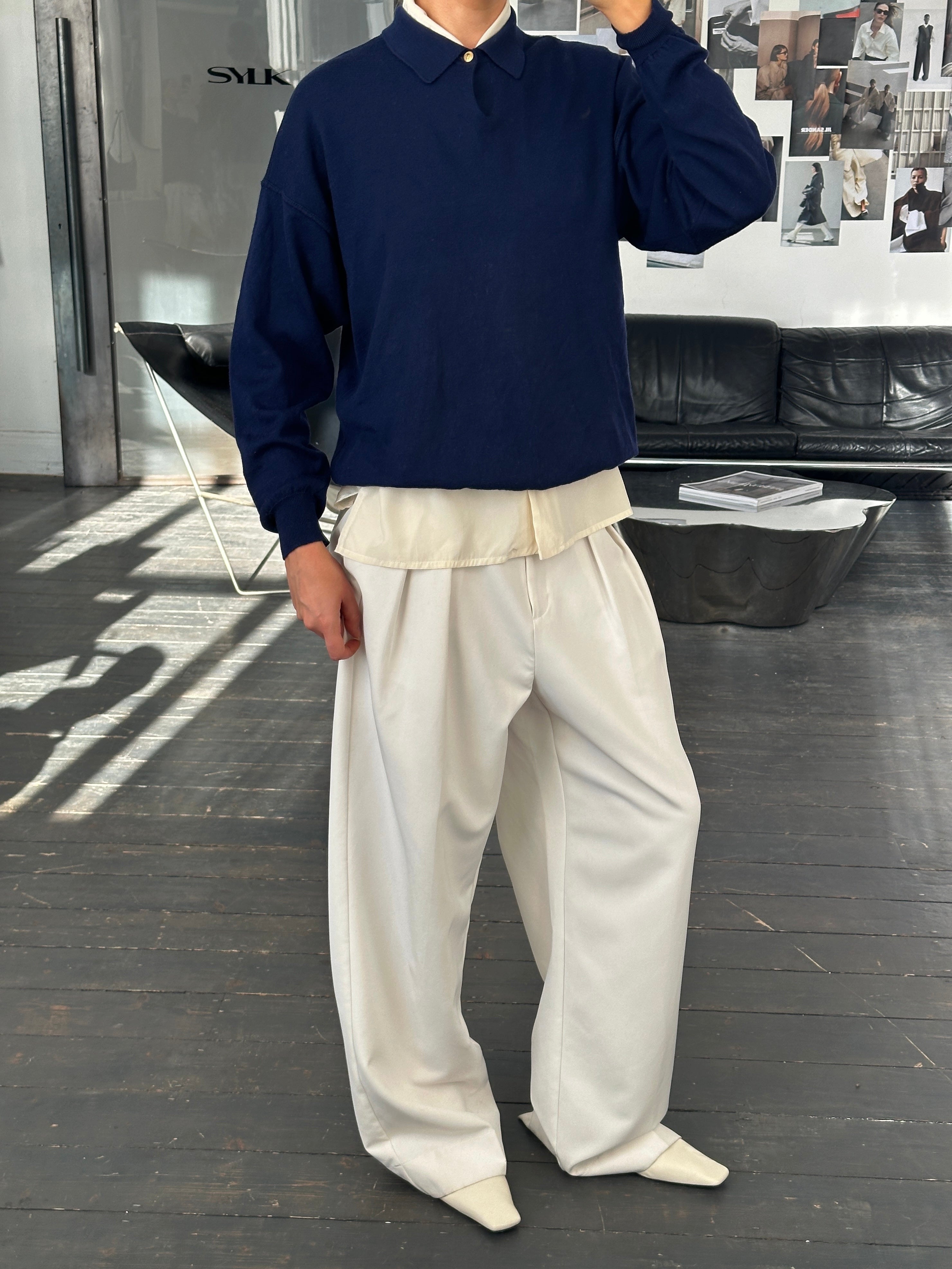 Versace Versus 1990s pure wool bespoke button polo jumper in size L, featuring a classic collar and elegant design.