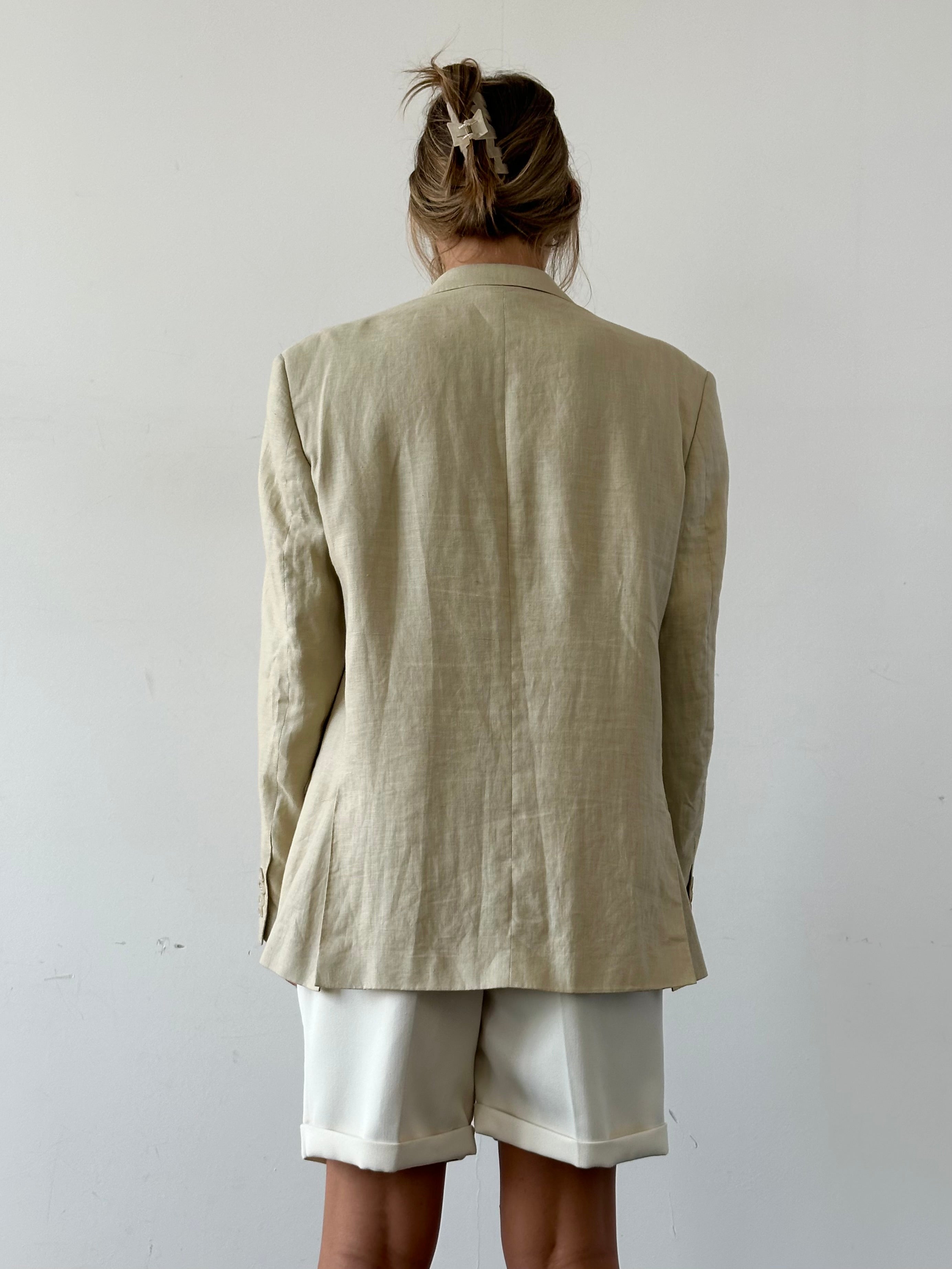 Vintage pure linen single-breasted blazer in size 42R/L, showcasing classic tailored design with a timeless linen fabric.