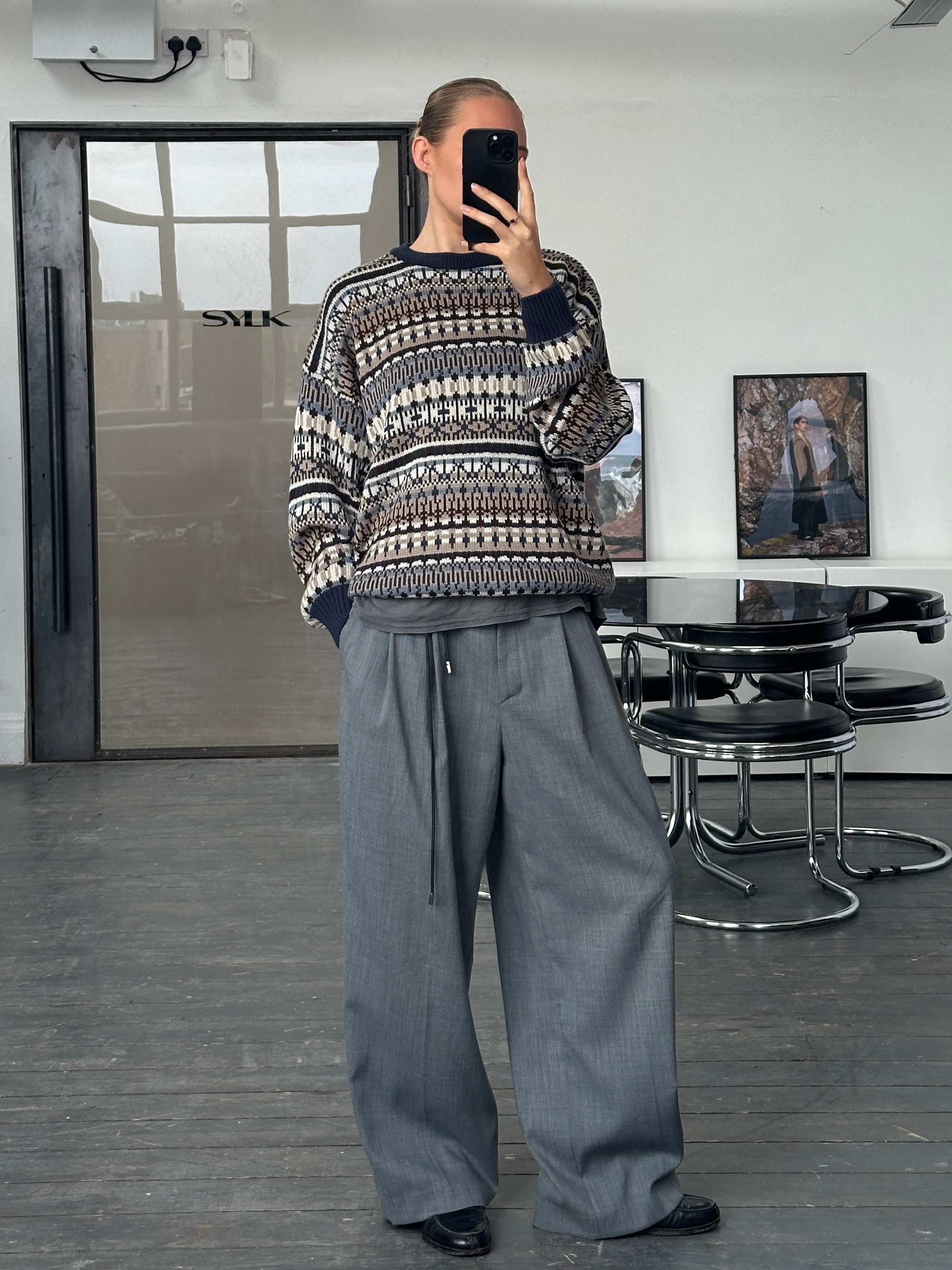 Vintage 1990s Fair Isle knitted jumper in size L/XL, featuring colorful traditional Nordic patterns on a cozy wool sweater.