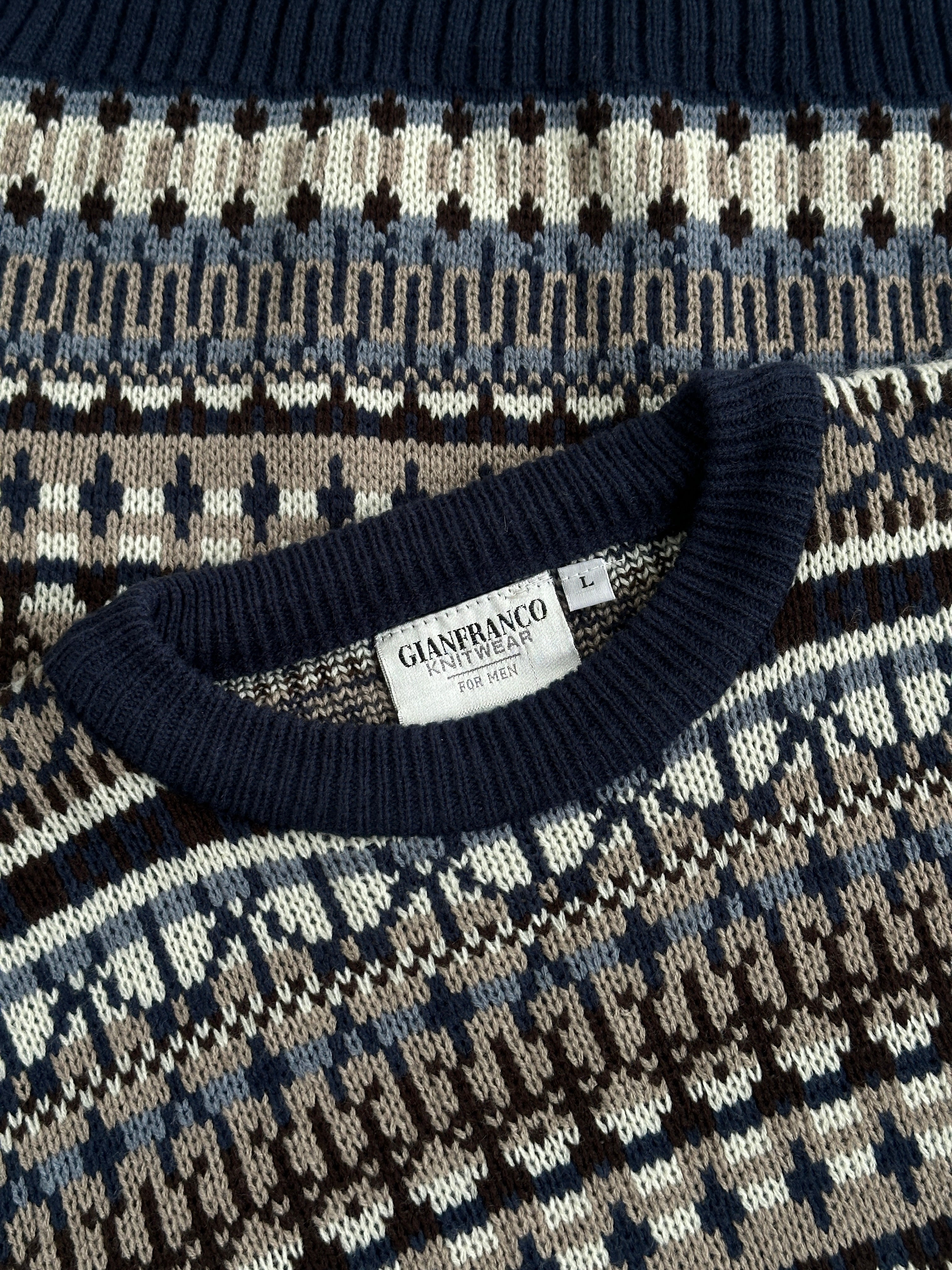 Vintage 1990s Fair Isle knitted jumper in size large/extra large, featuring colorful traditional patterns and cozy wool fabric.