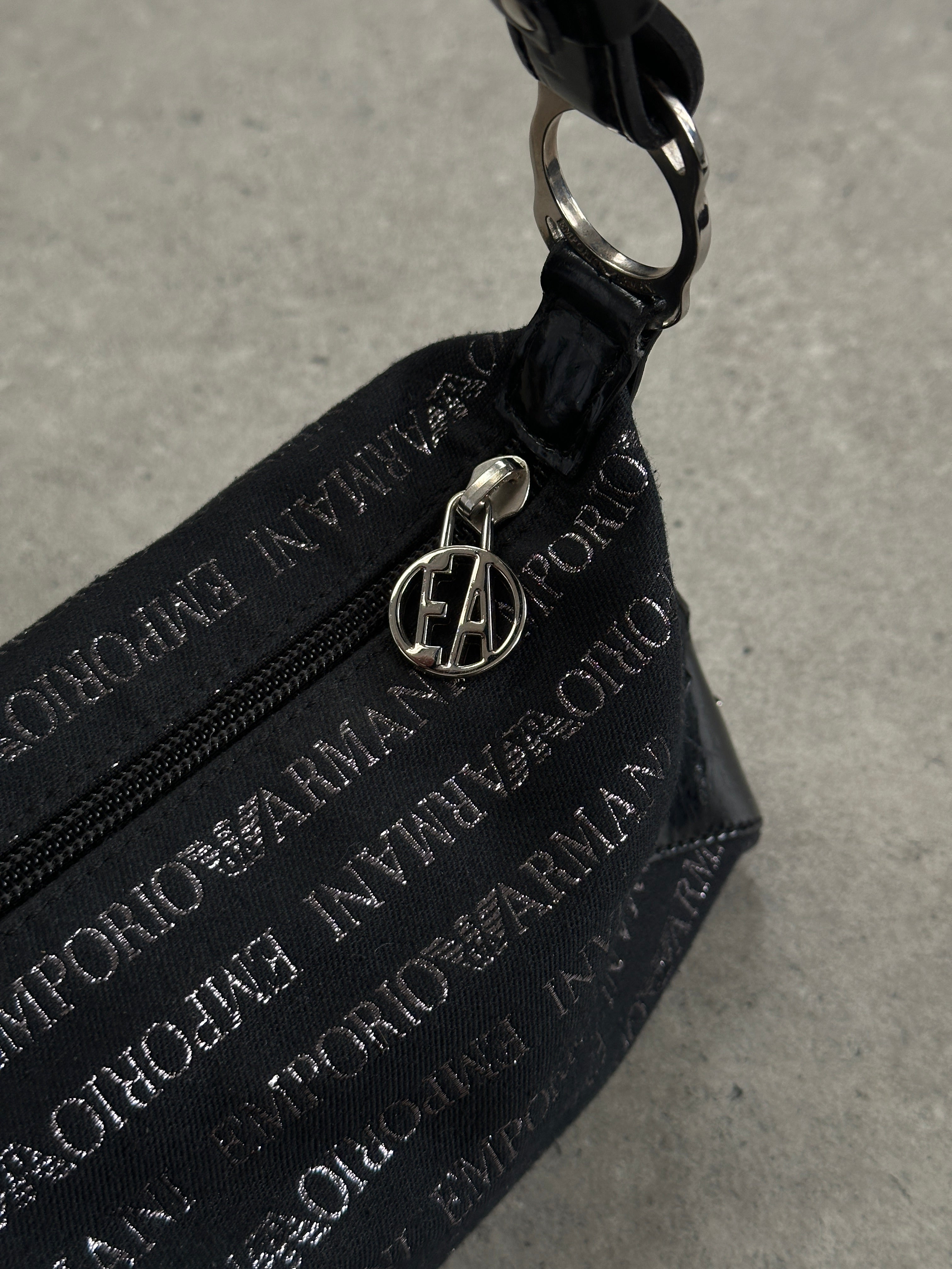 Emporio Armani Monogram Shoulder Bag in black leather with gold-tone hardware and signature logo detailing