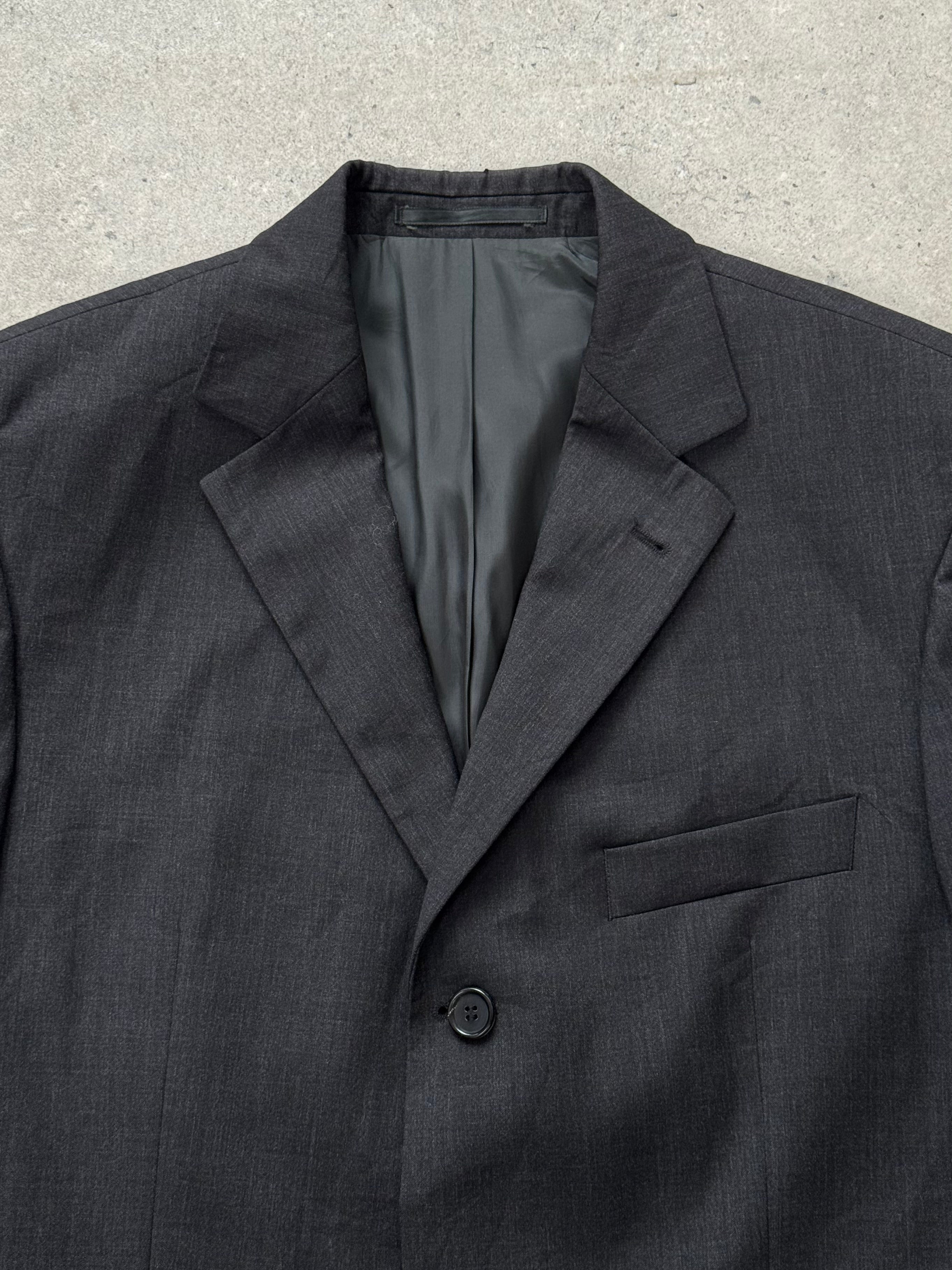 Hugo Boss x Loro Piana 2000s pure wool single-breasted blazer in size 40R/L, dark tailored men's jacket with notch lapel.