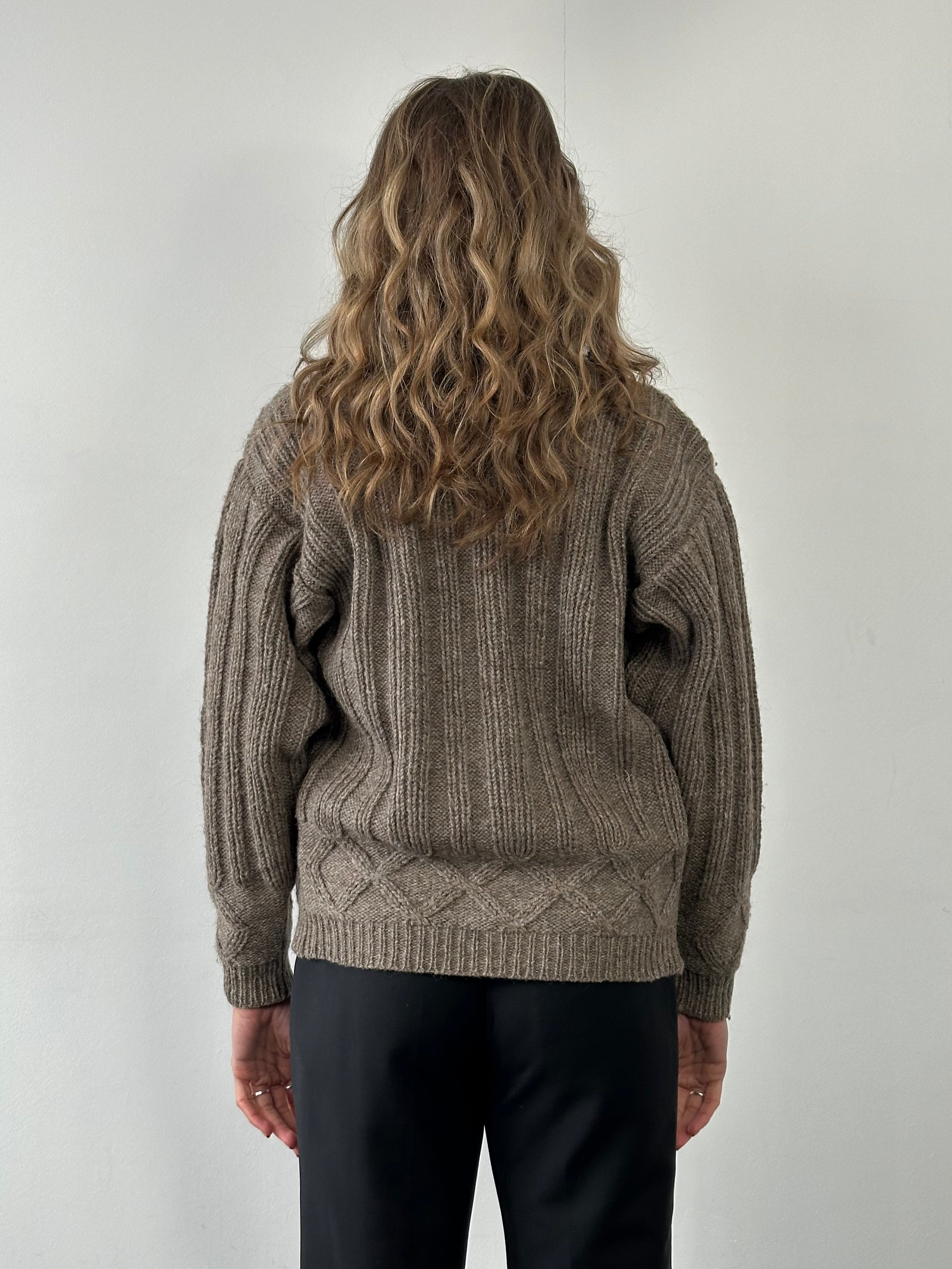 Kenzo pure wool chunky cable knit cardigan in cream, featuring a cozy, oversized design with textured cable patterns.