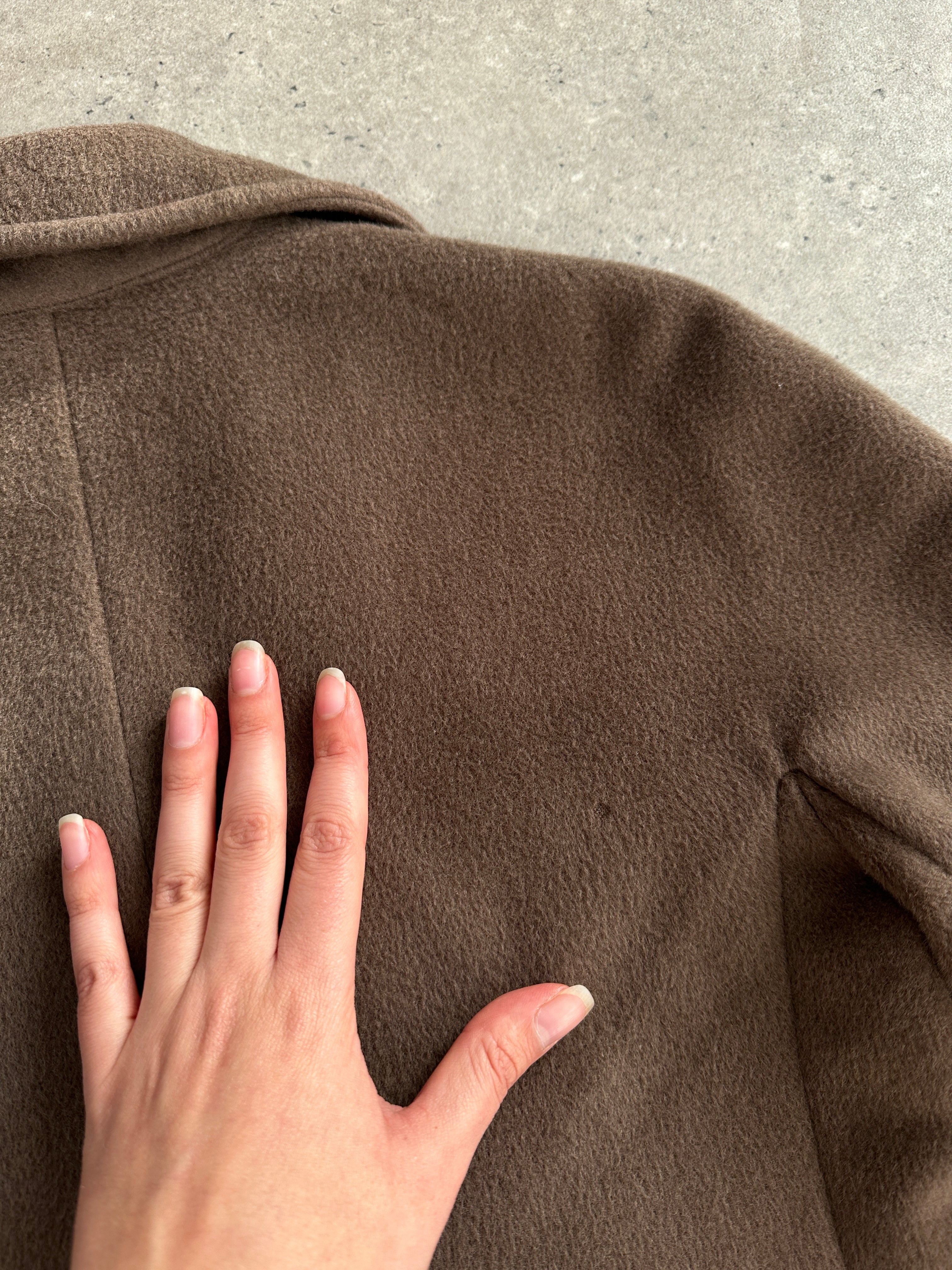 Max Mara double-breasted wool coat in size S, featuring classic design and tailored fit, shown in a neutral color.