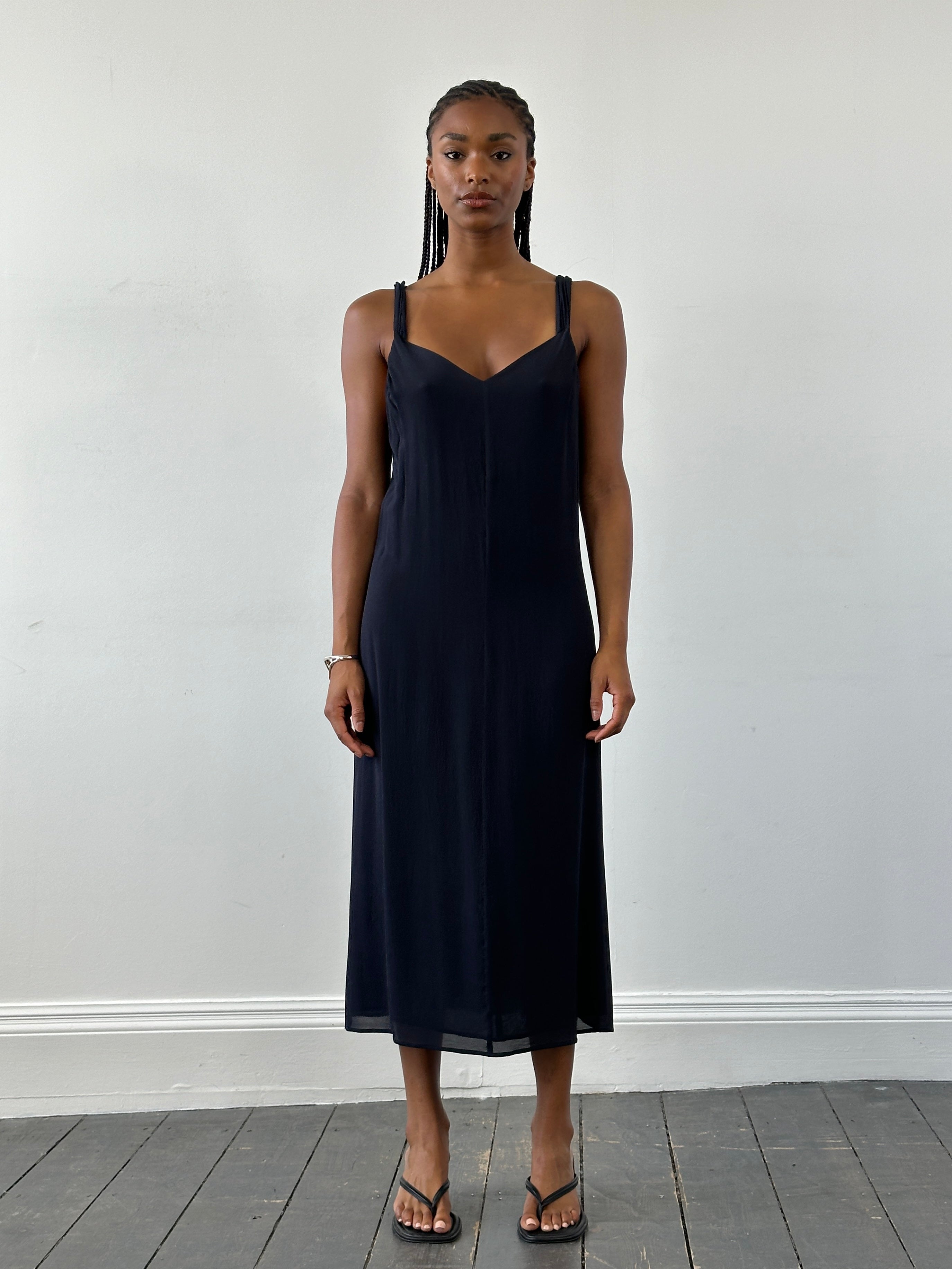 Max Mara pure silk V-neck maxi dress in a flowing design, displayed in a natural stance on a neutral background.