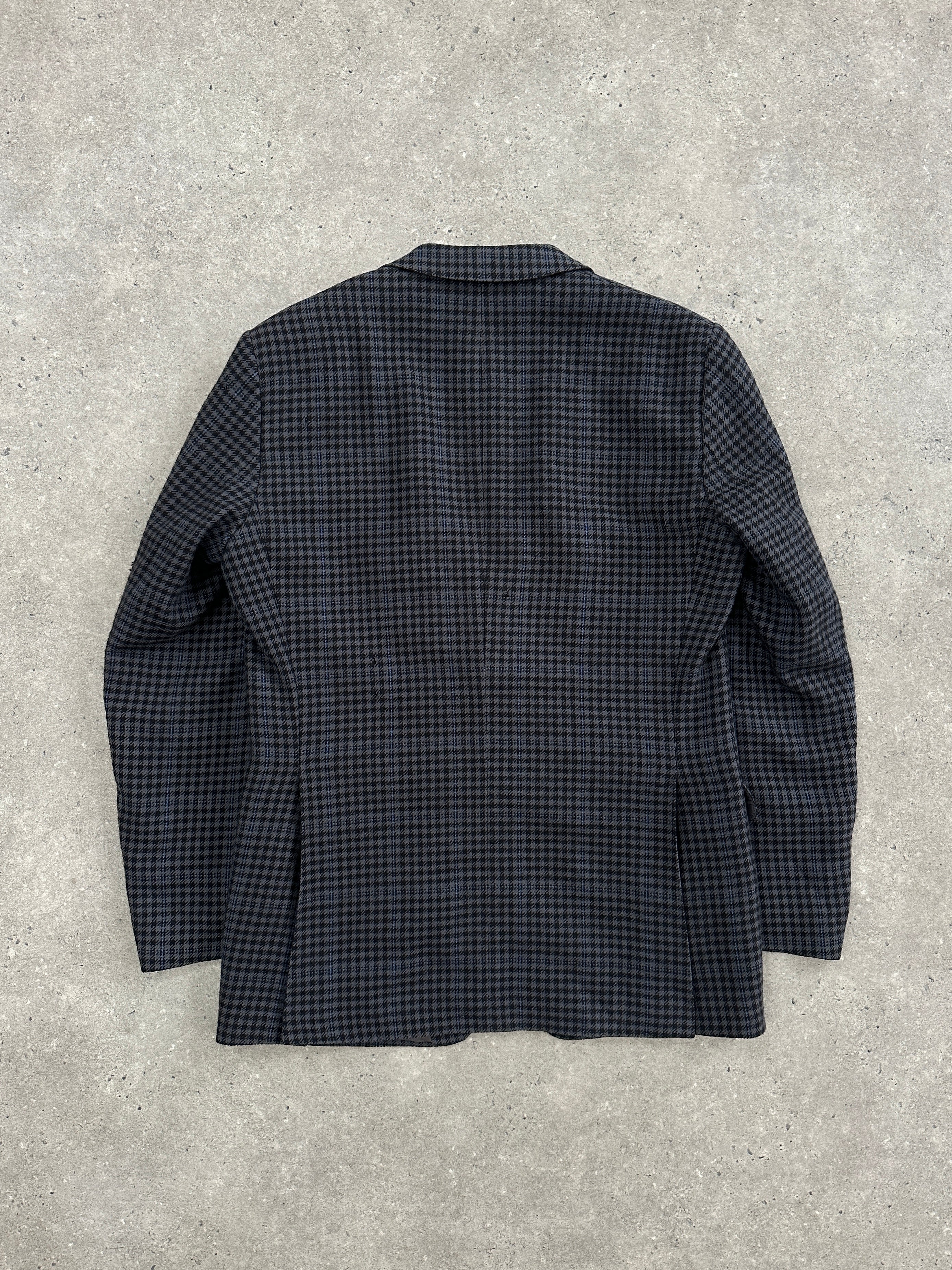 Yves Saint Laurent 1980s check brushed wool blazer in size 40R/L, featuring a tailored fit and classic pattern.