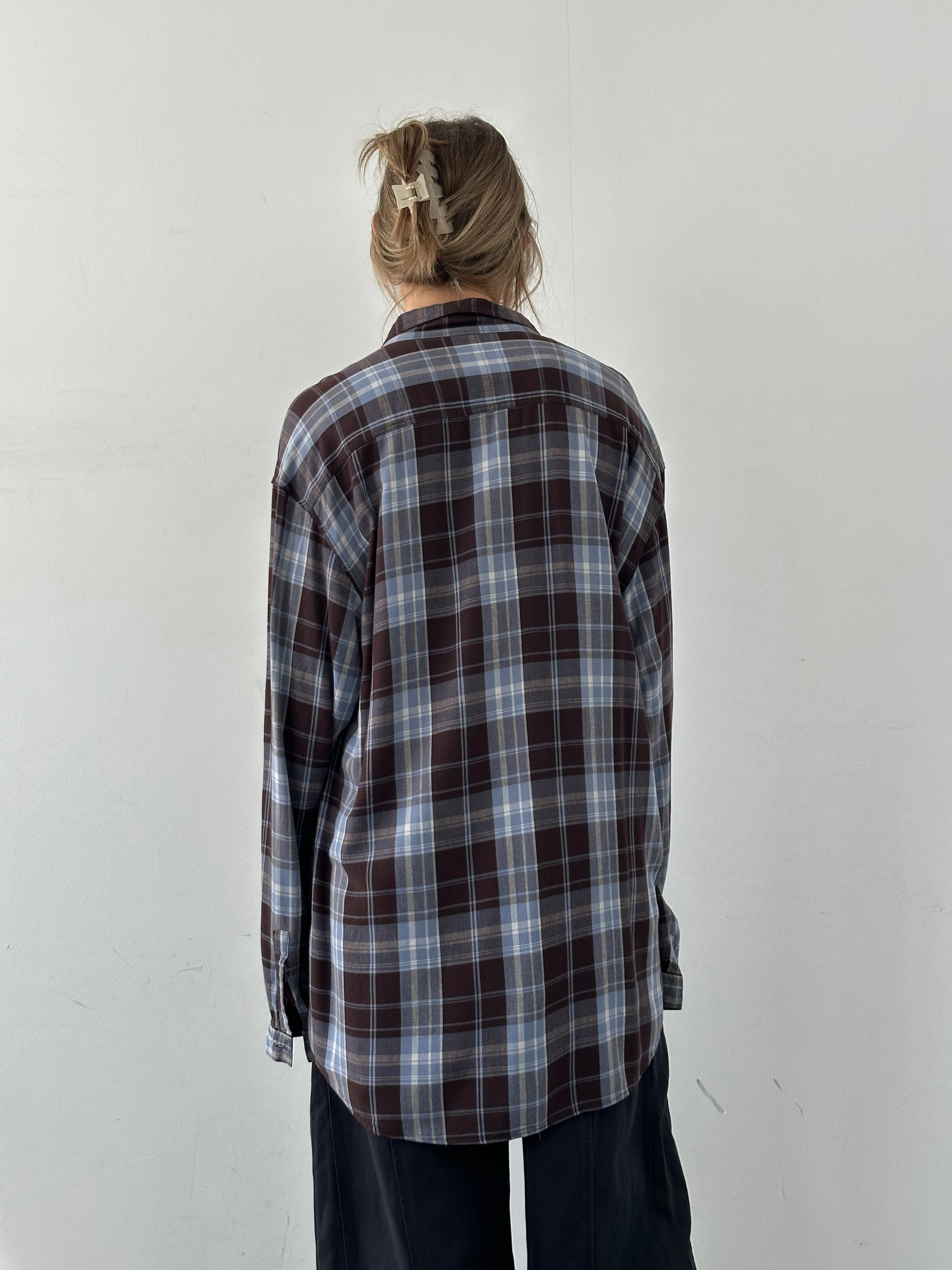 Armani Jeans 90s check flannel shirt in XXL, featuring classic plaid pattern and button-up style on a casual shirt.