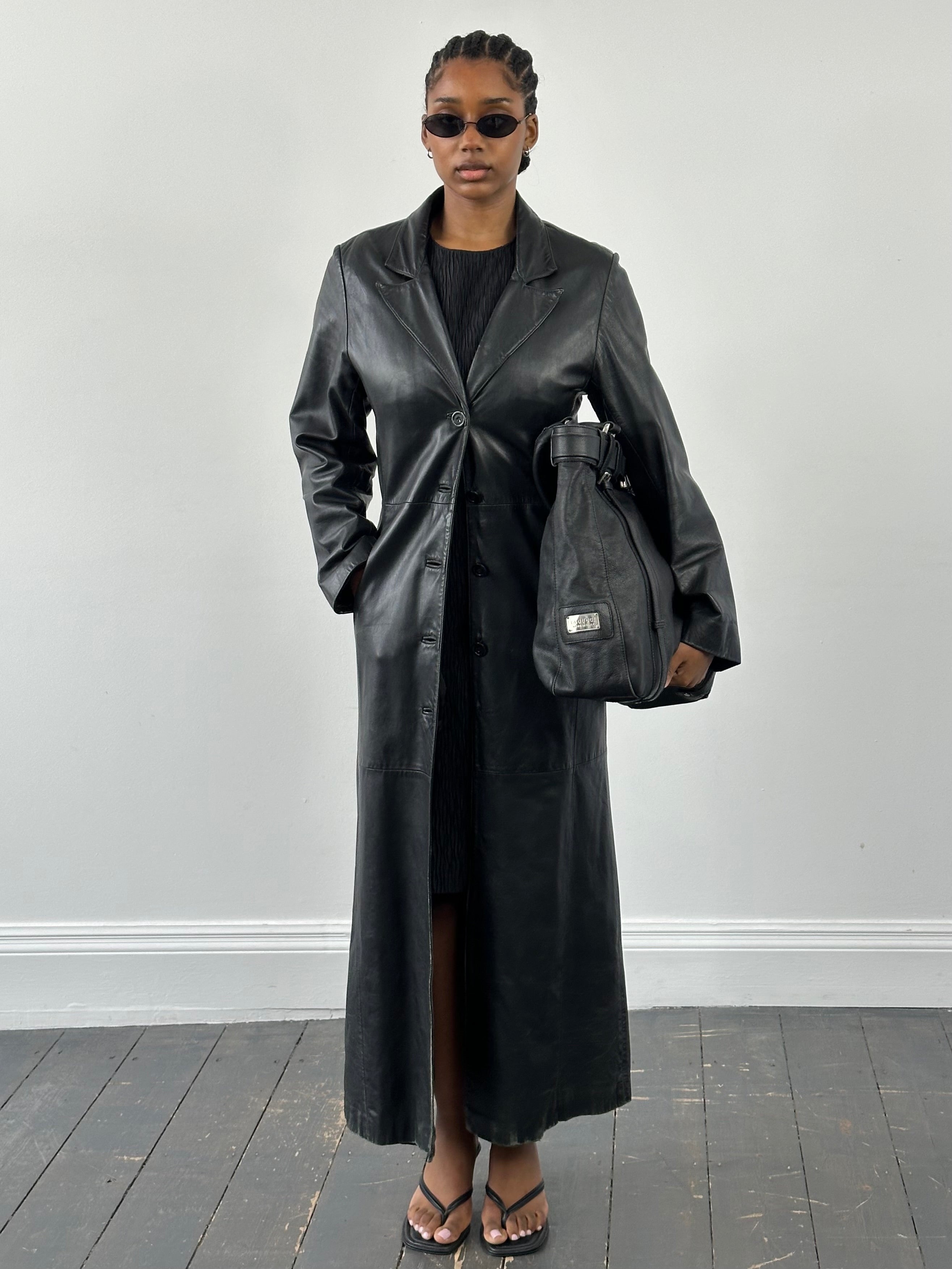 Vintage 1990s floor-length leather trench coat, S/M, featuring classic design and rich leather texture.