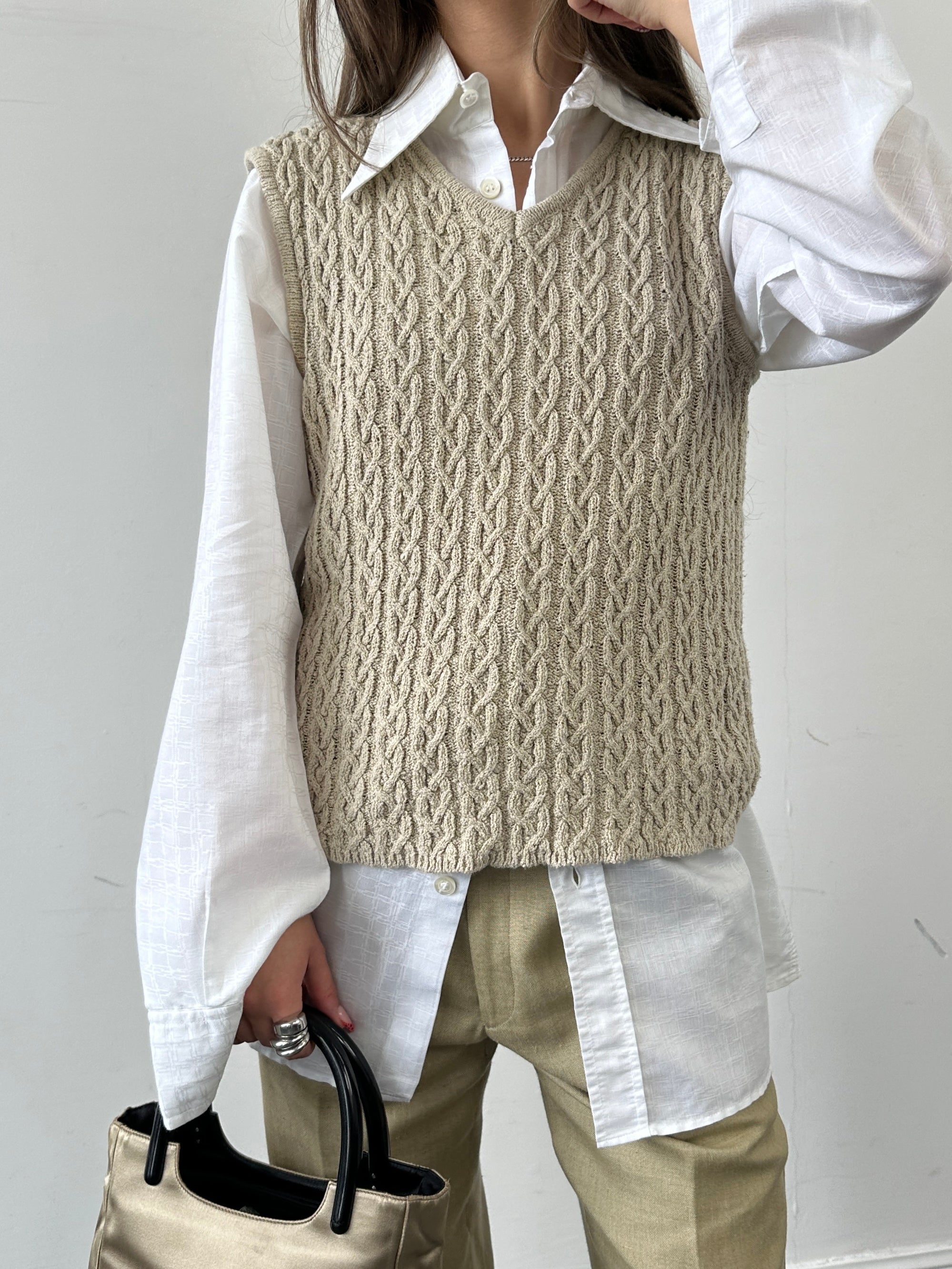 Vintage cotton Aran knit vest in S/M size, featuring textured knit pattern and classic design, perfect for layered style.