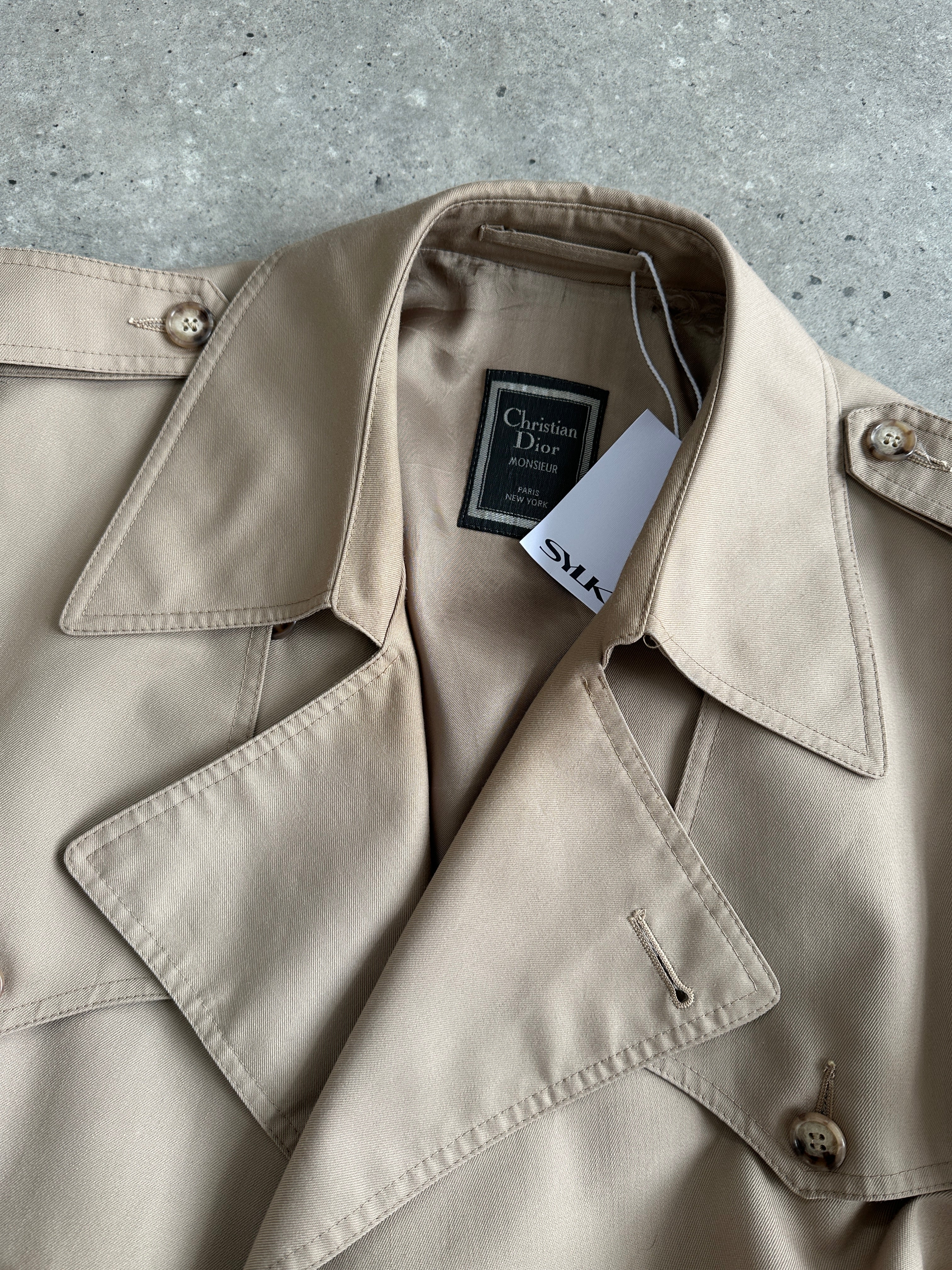 Christian Dior Monsieur double-breasted belted trench coat in size L/XL, beige fabric with classic design and stylish details.