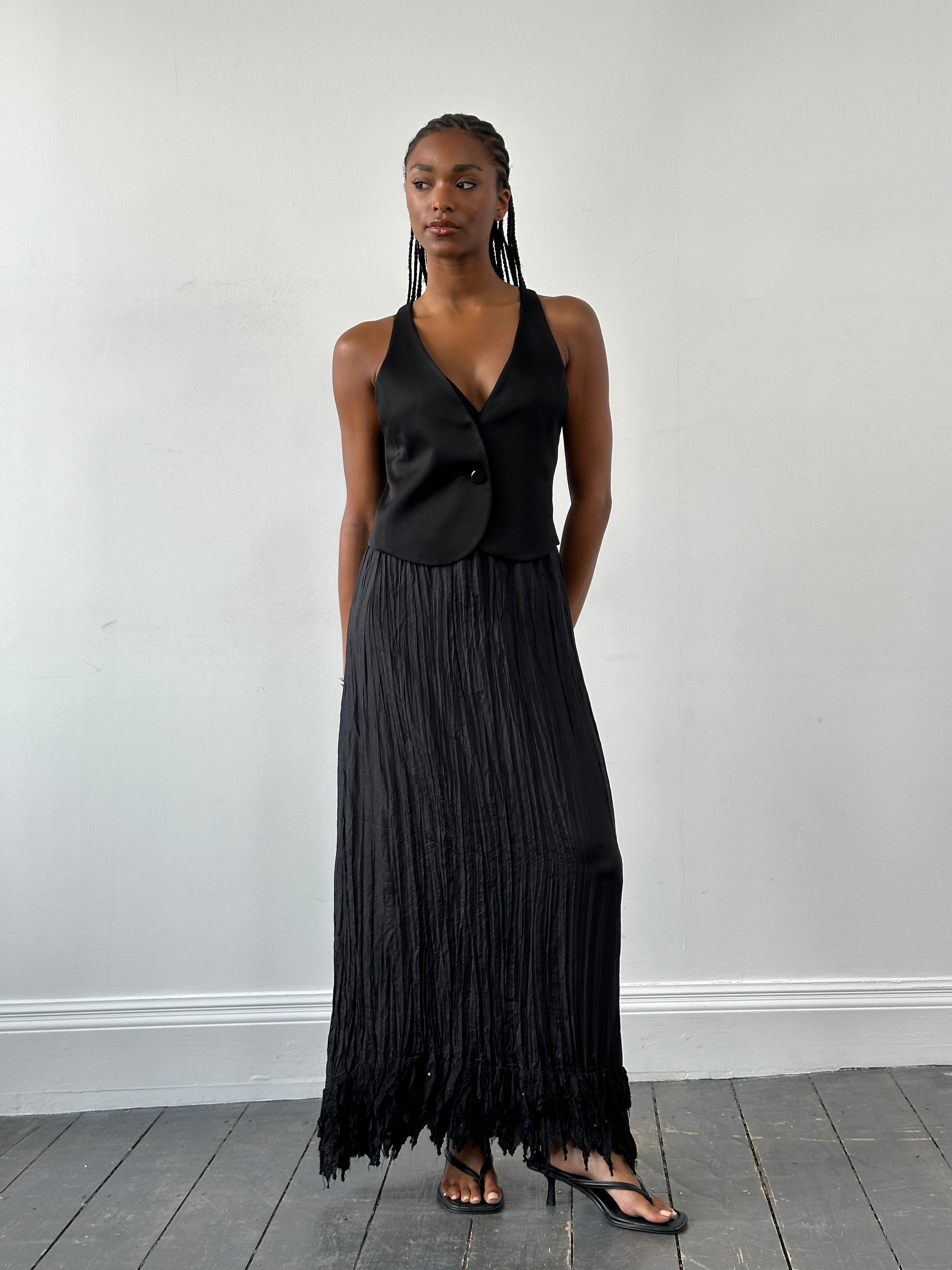 Italian Vintage 2000s pure silk crinkle midi skirt in S/M, featuring a flowing, textured fabric and vintage style.