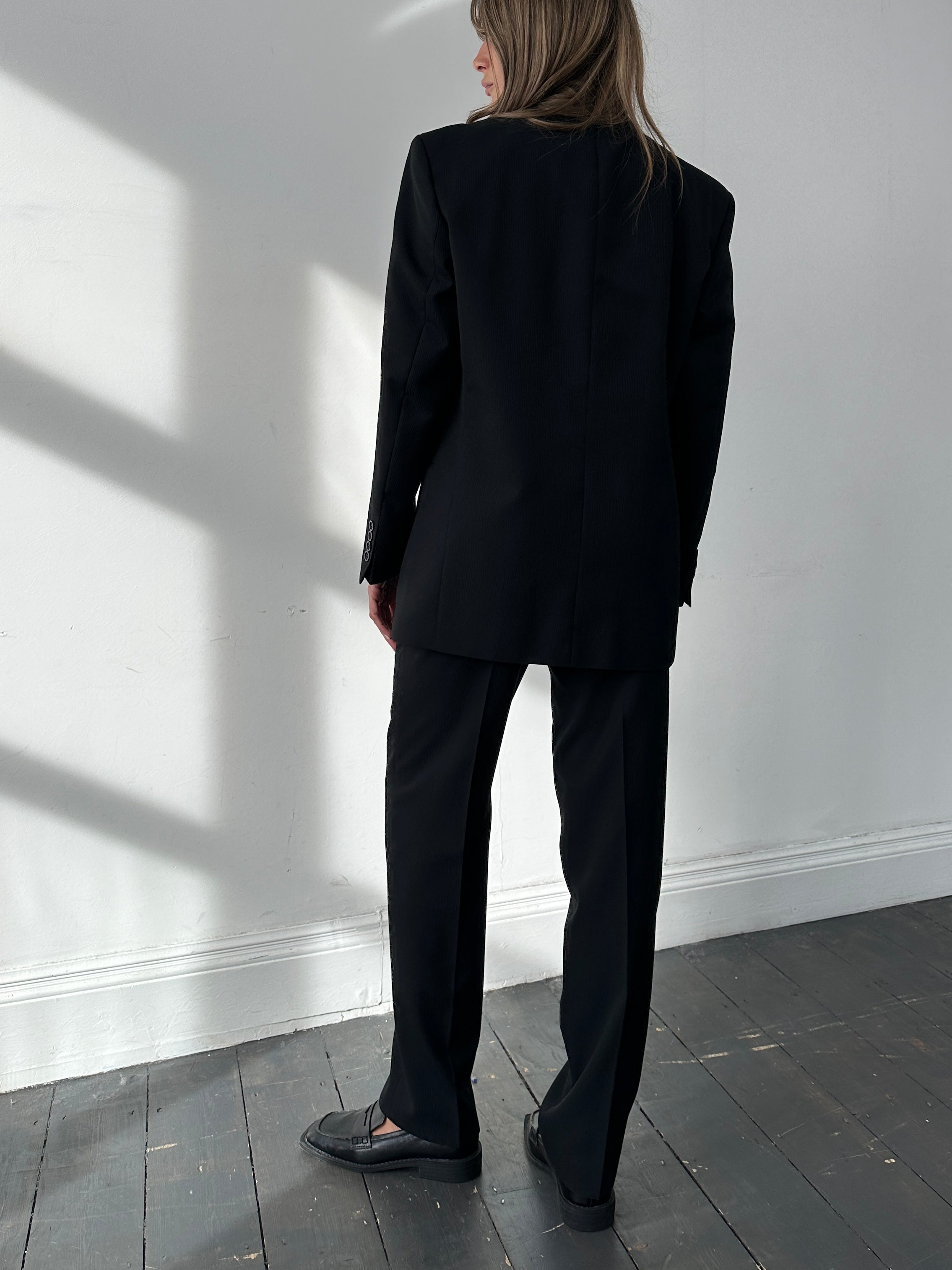 Vintage wool ribbed three-piece suit in size 38R, featuring tailored jacket, vest, and trousers, classic and stylish for formal wear.