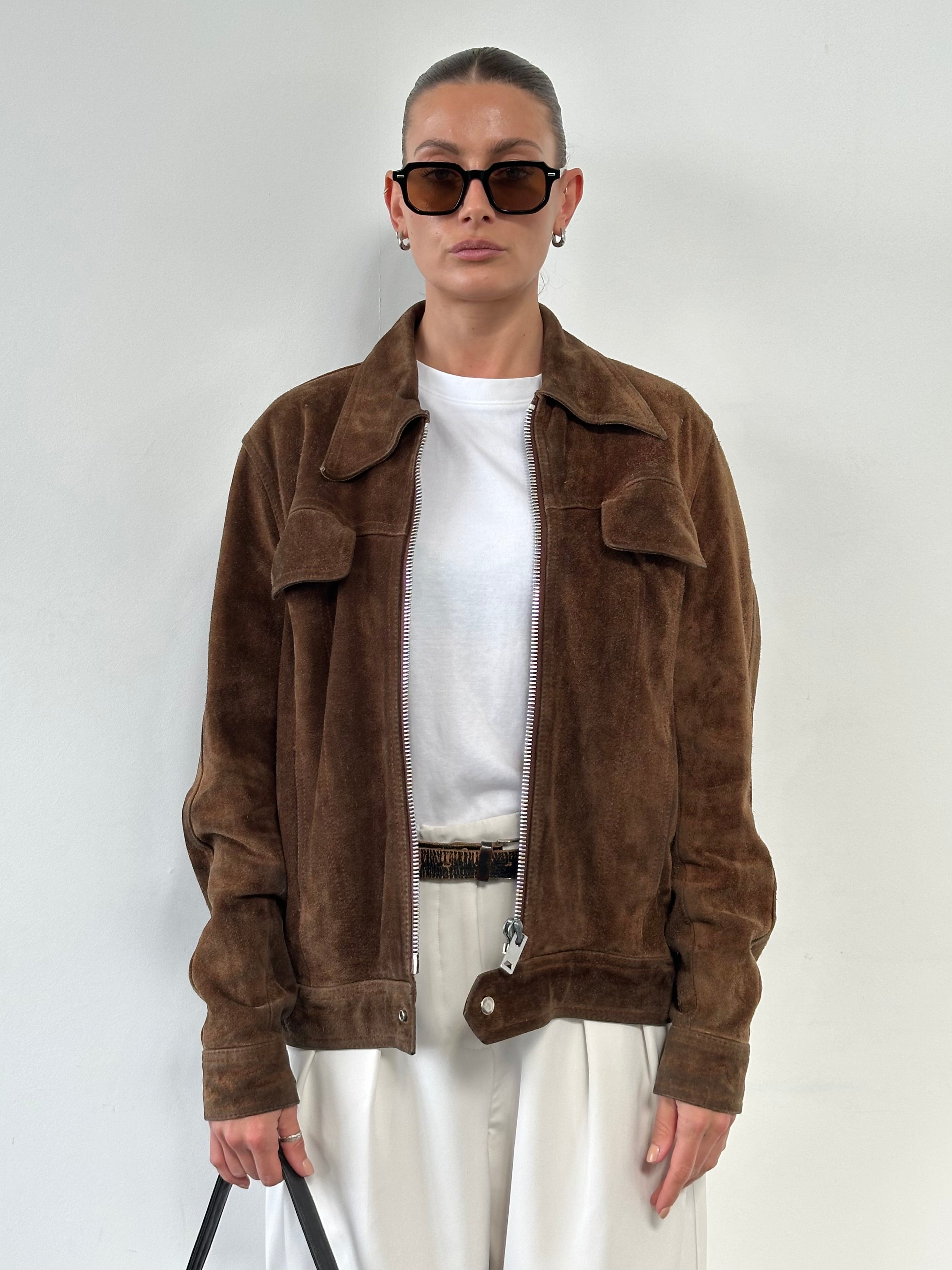 Vintage Dagger Collar Suede Jacket in size L, featuring a classic collar and soft suede material, displayed on a hanger.