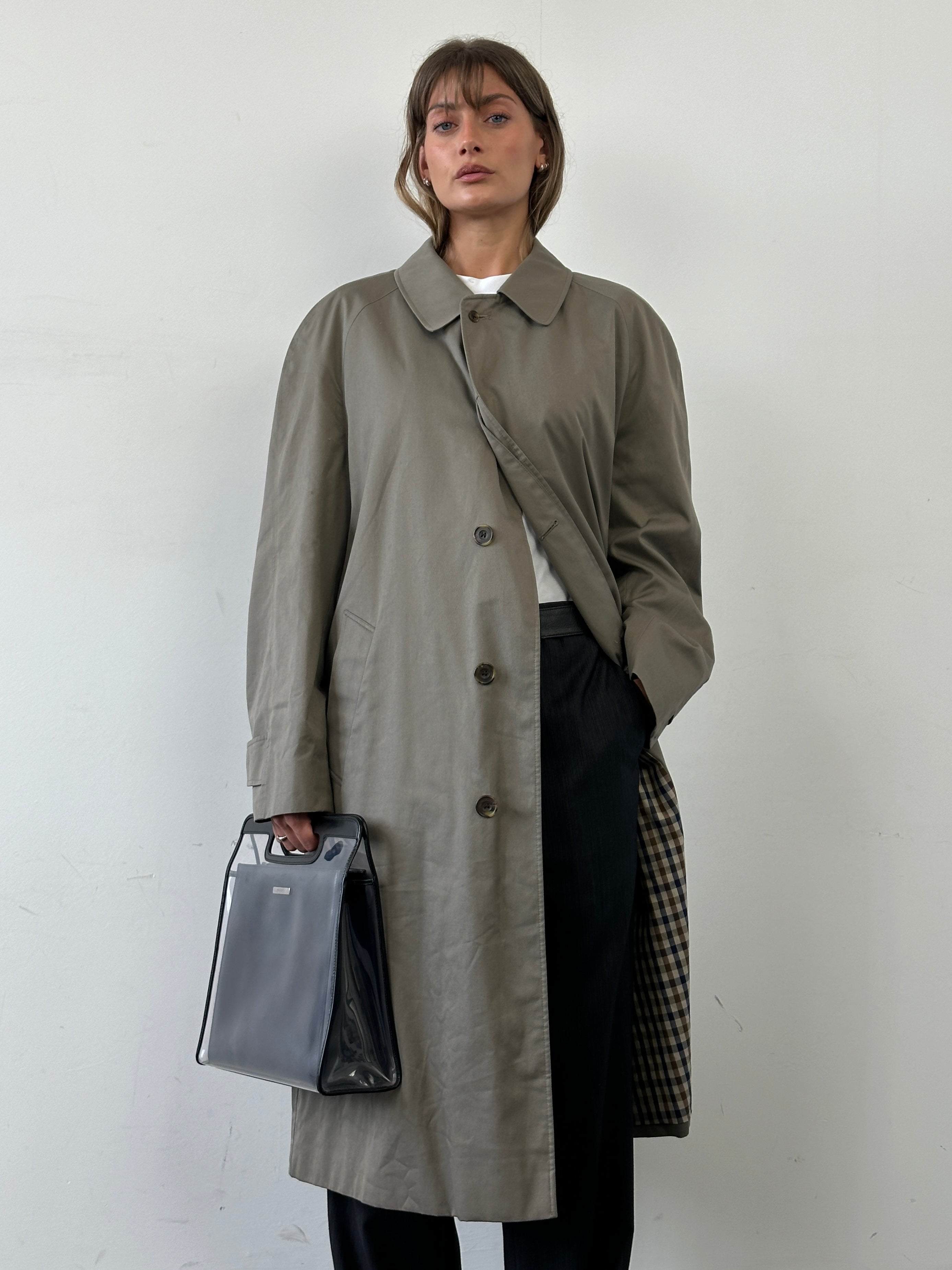 Aquascutum cotton trench coat with concealed placket in size XL, stylish and classic outerwear for men.