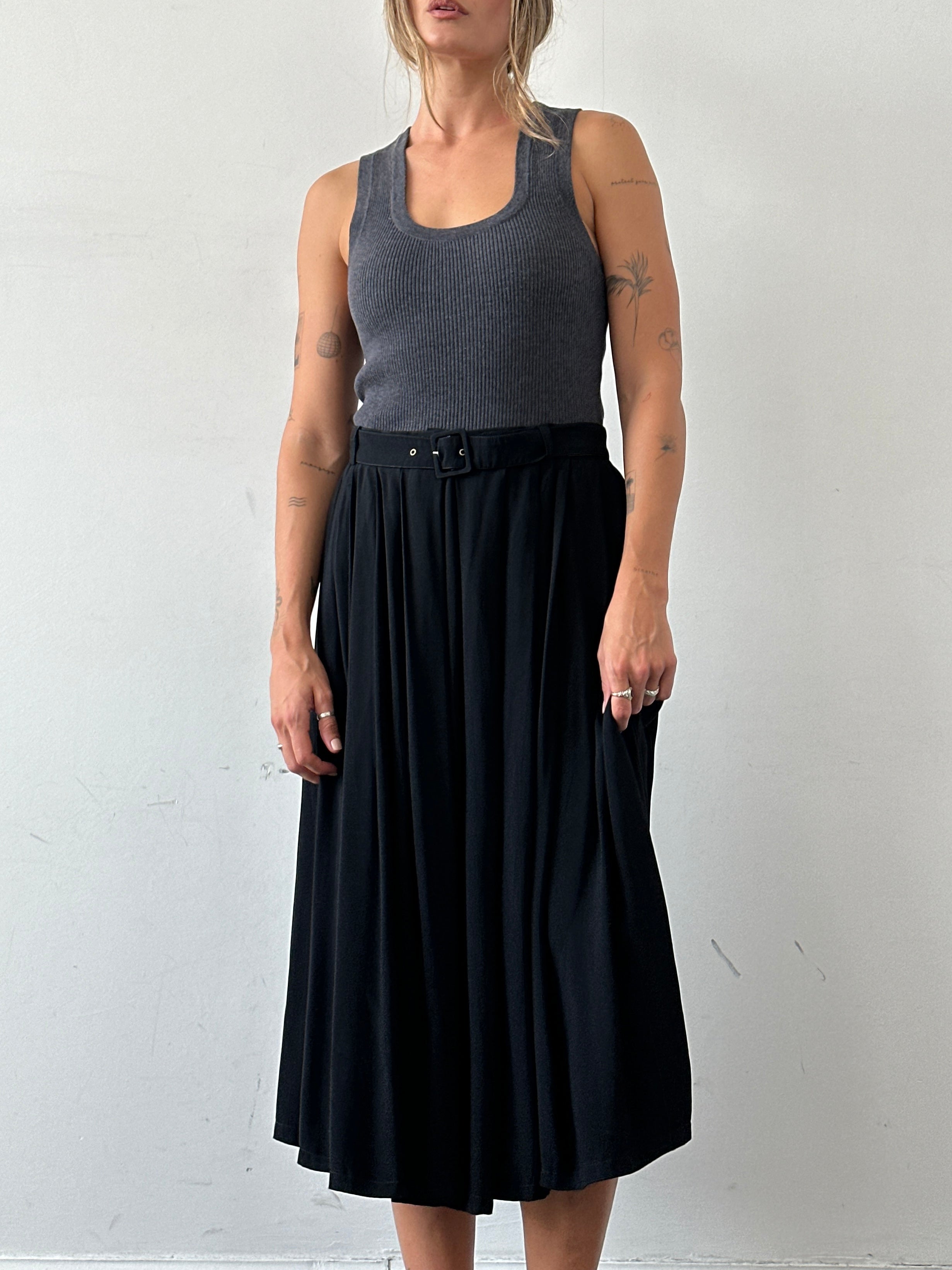 Iceberg pleated belted midi skirt in a stylish design, featuring a waist belt and flowing fabric, size W28.
