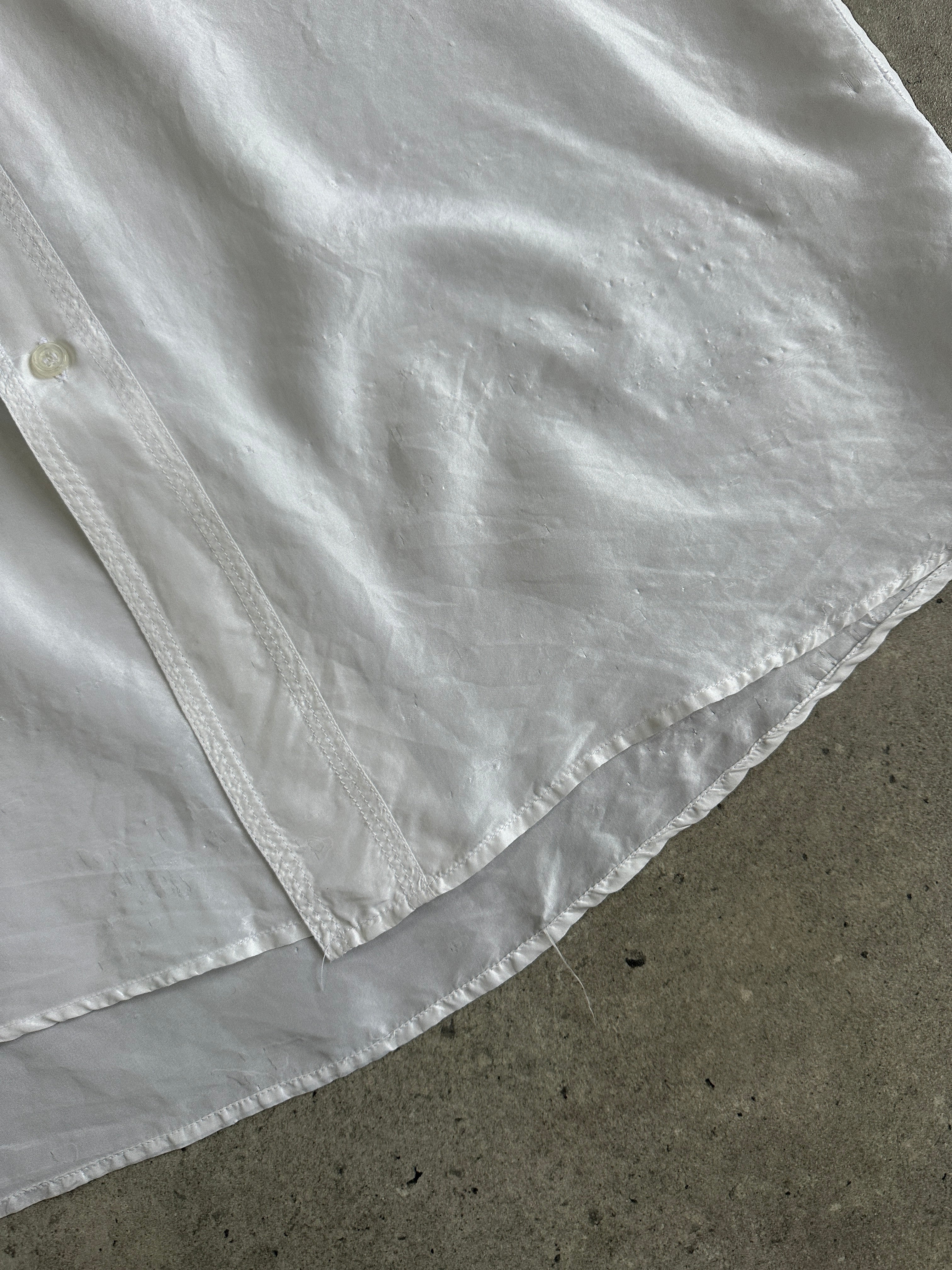 Vintage 1990s pure silk shirt in XL size, featuring classic design and smooth fabric, perfect for vintage fashion enthusiasts.