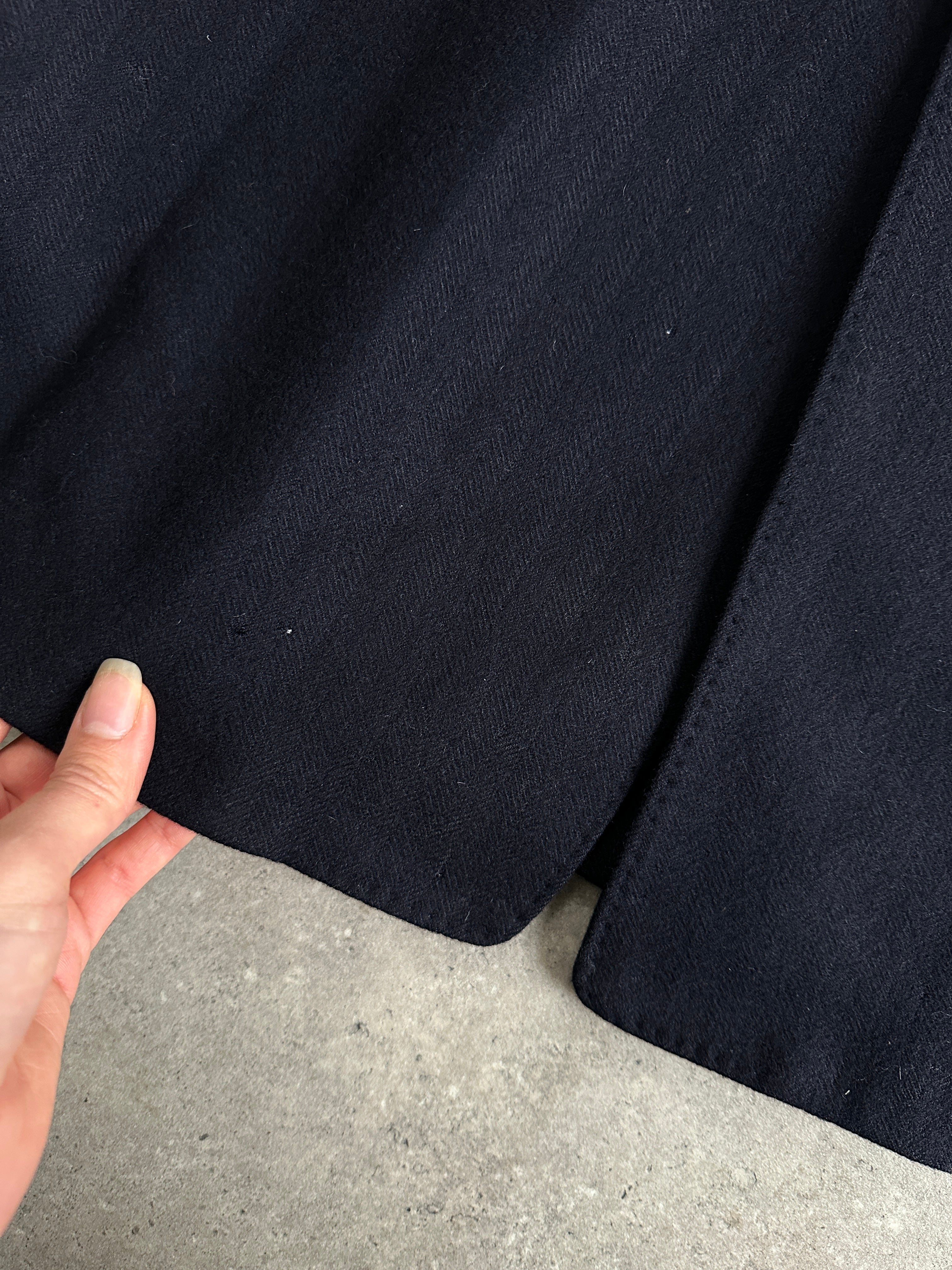 Christian Dior pure wool coat with concealed placket, oversized XL style, shown on a neutral background.