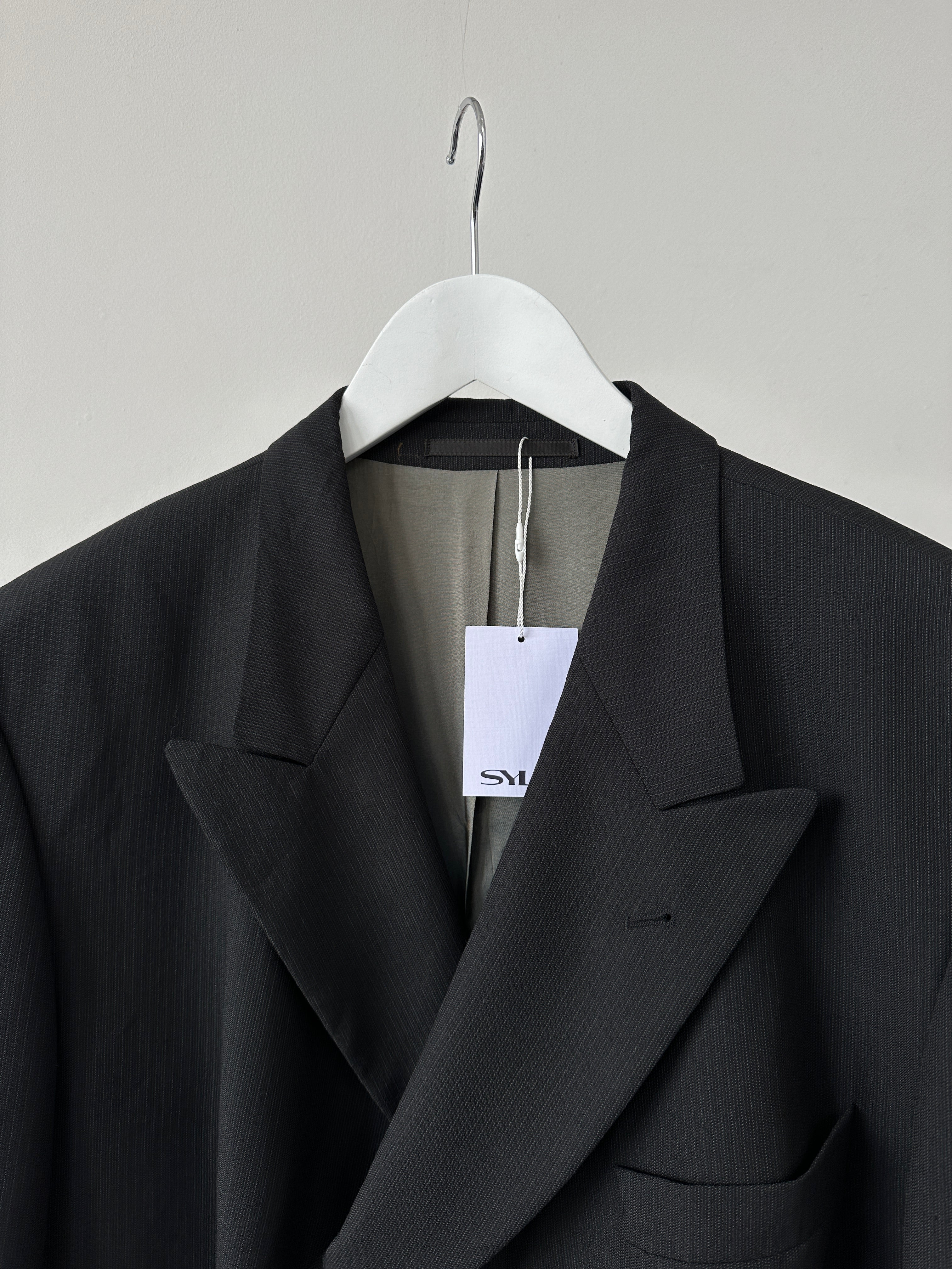 Hugo Boss double-breasted pure wool blazer in XXL, showing the tailored fit and classic lapel design on a neutral background.