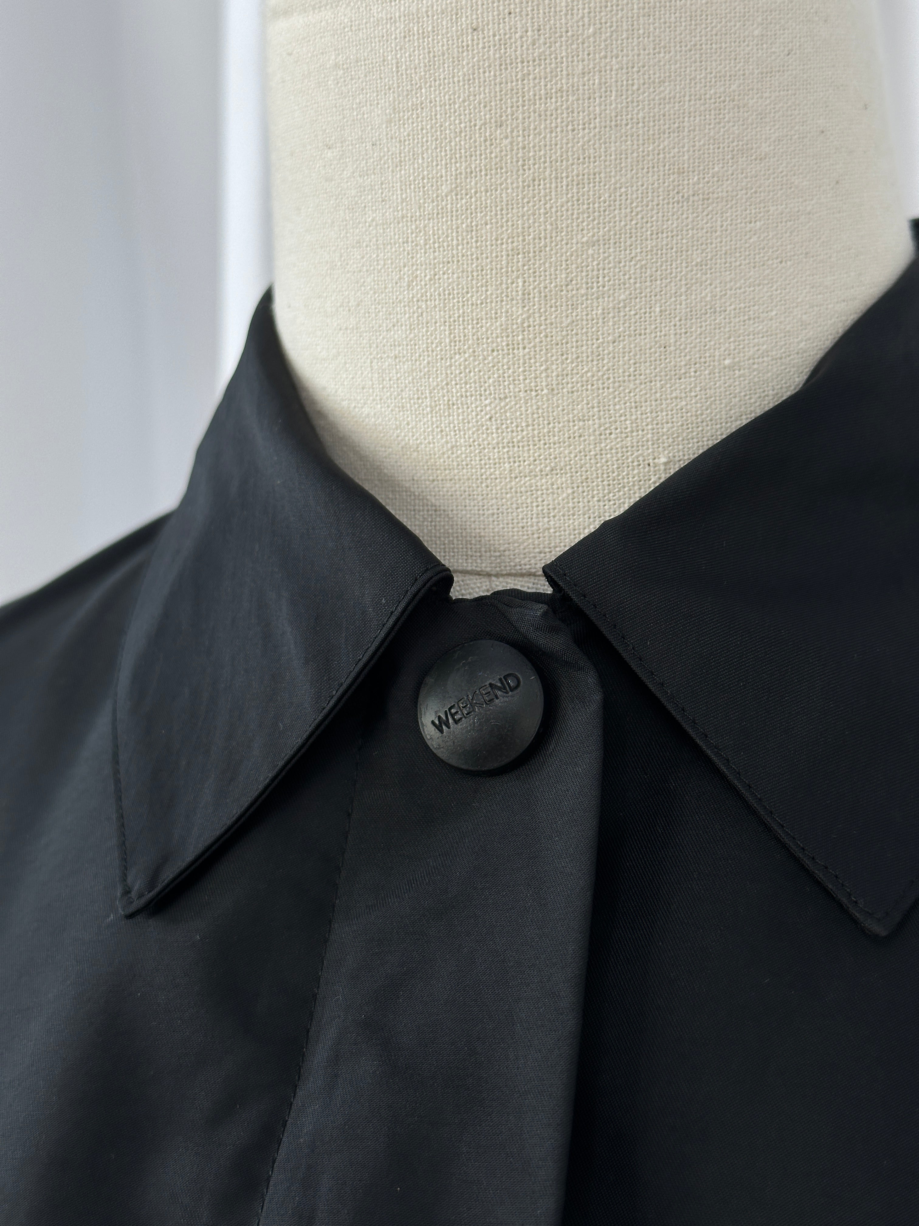 Max Mara Weekend 2000s bomber jacket with concealed placket, lightweight design, in a neutral color, displayed on a hanger.