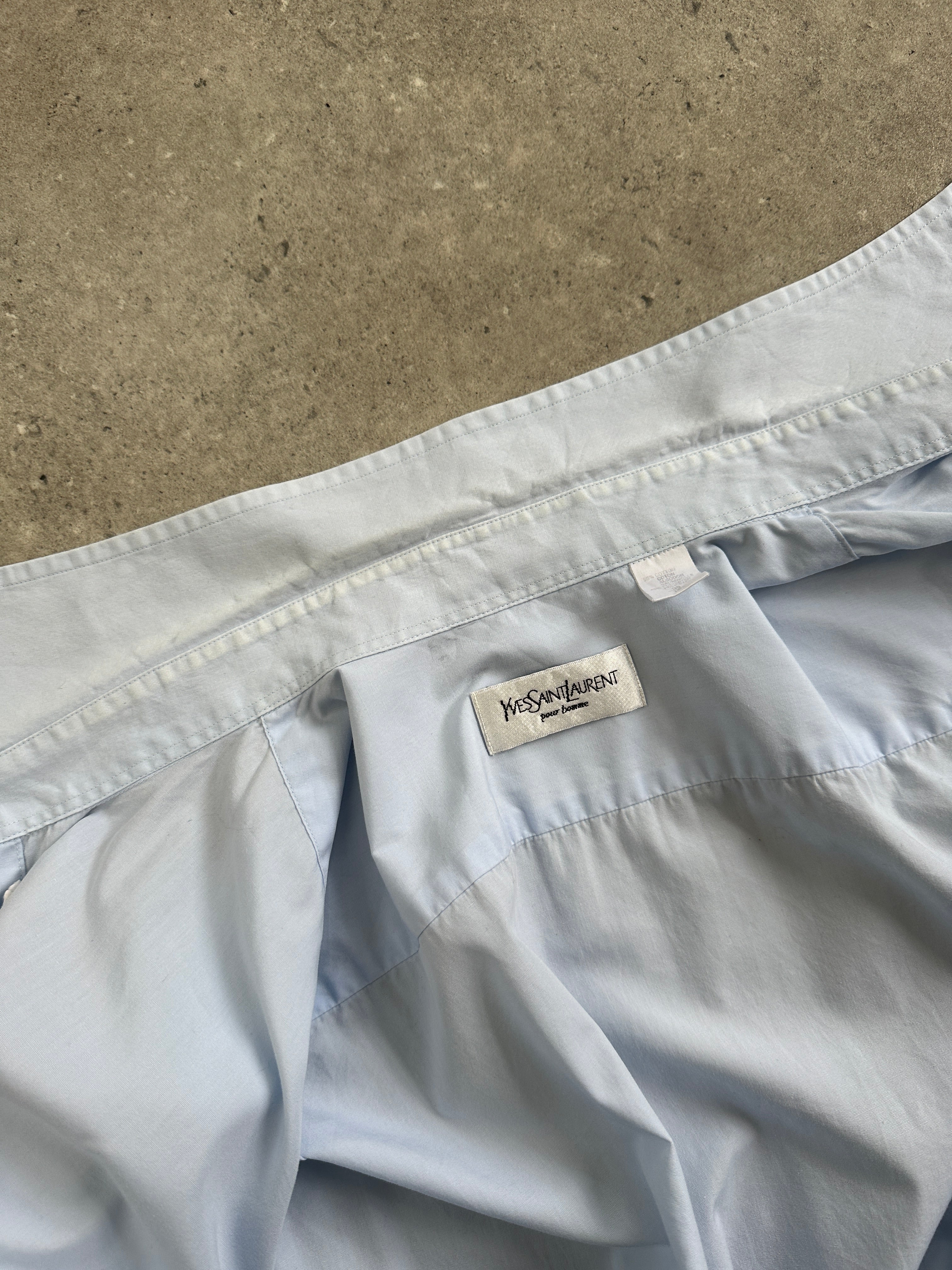 Yves Saint Laurent Pour Homme cotton short sleeve logo shirt in size L, featuring a classic design with the brand's logo on the front.