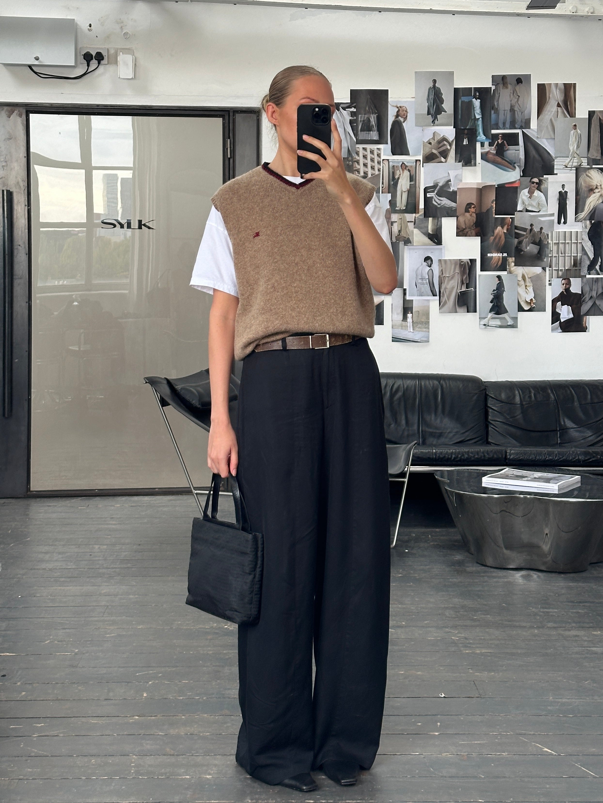 Burberry London 2000s pure wool sleeveless logo knitted jumper in beige, styled with a round neckline and sleeveless design.