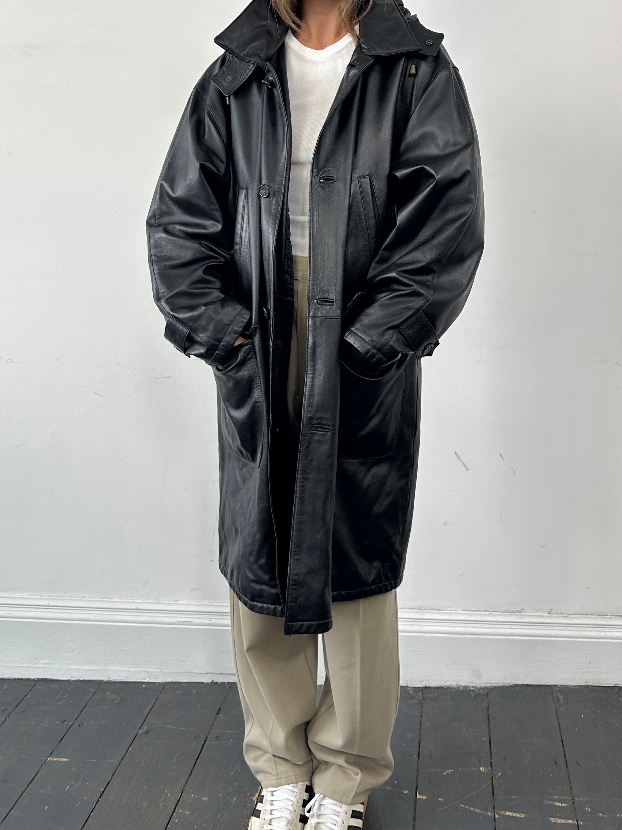 Italian vintage leather hooded trench coat in XL/XXL, featuring classic design and rugged leather texture.