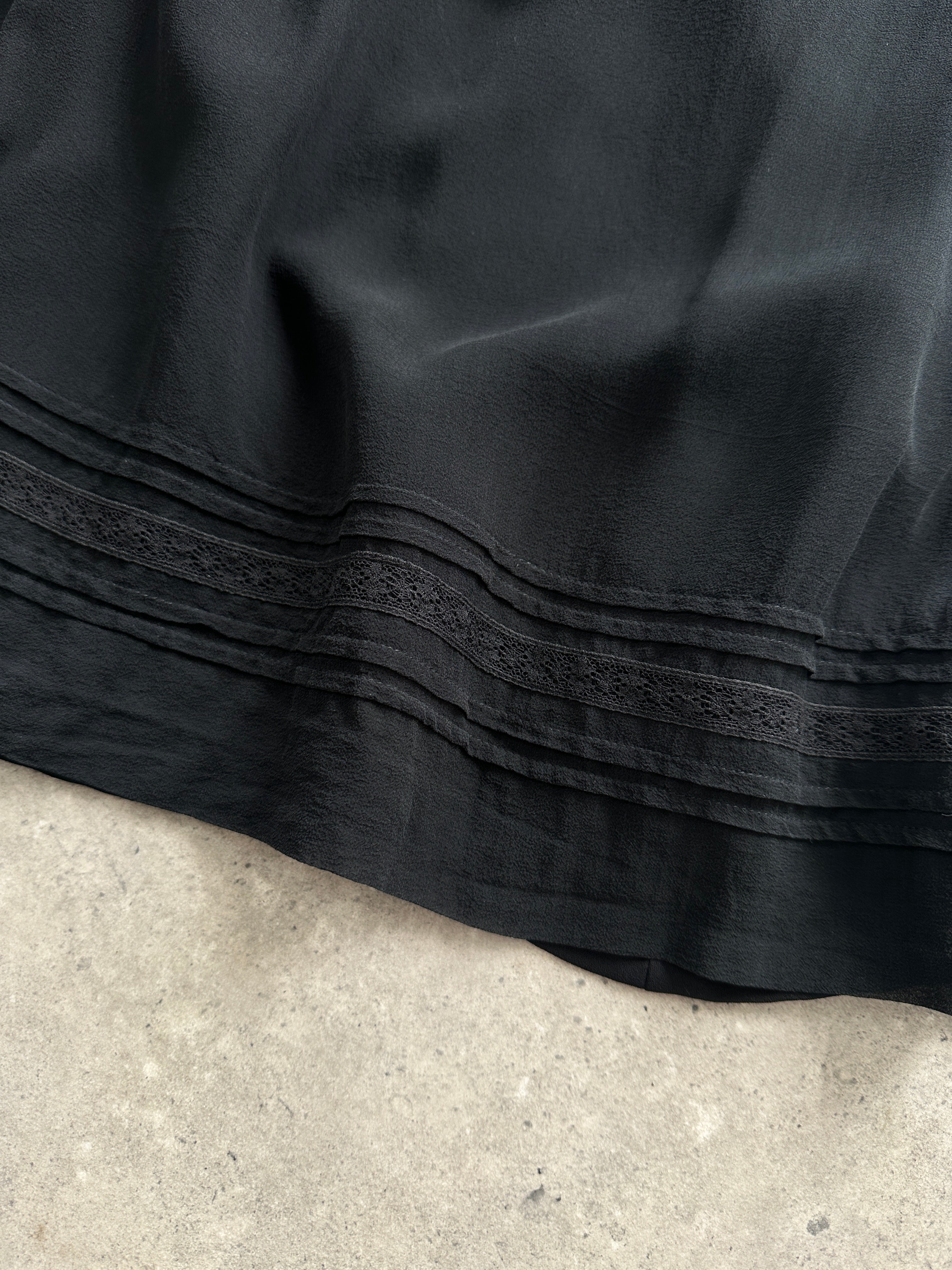Laura Ashley pure silk pleated slip dress in size XS, showcasing a sleek, elegant design with fine pleats and a smooth silk fabric.