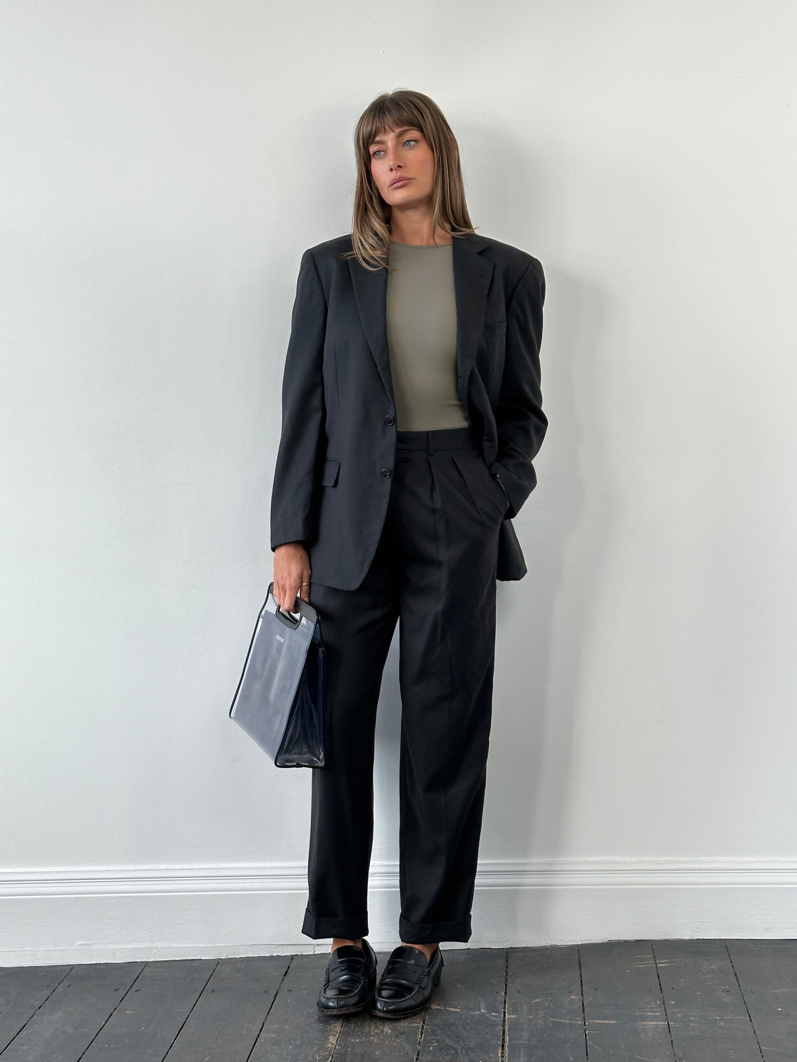 Vintage Japanese 1990s pure wool straight leg suit in size 40R/W26, featuring classic tailored fit and timeless style.