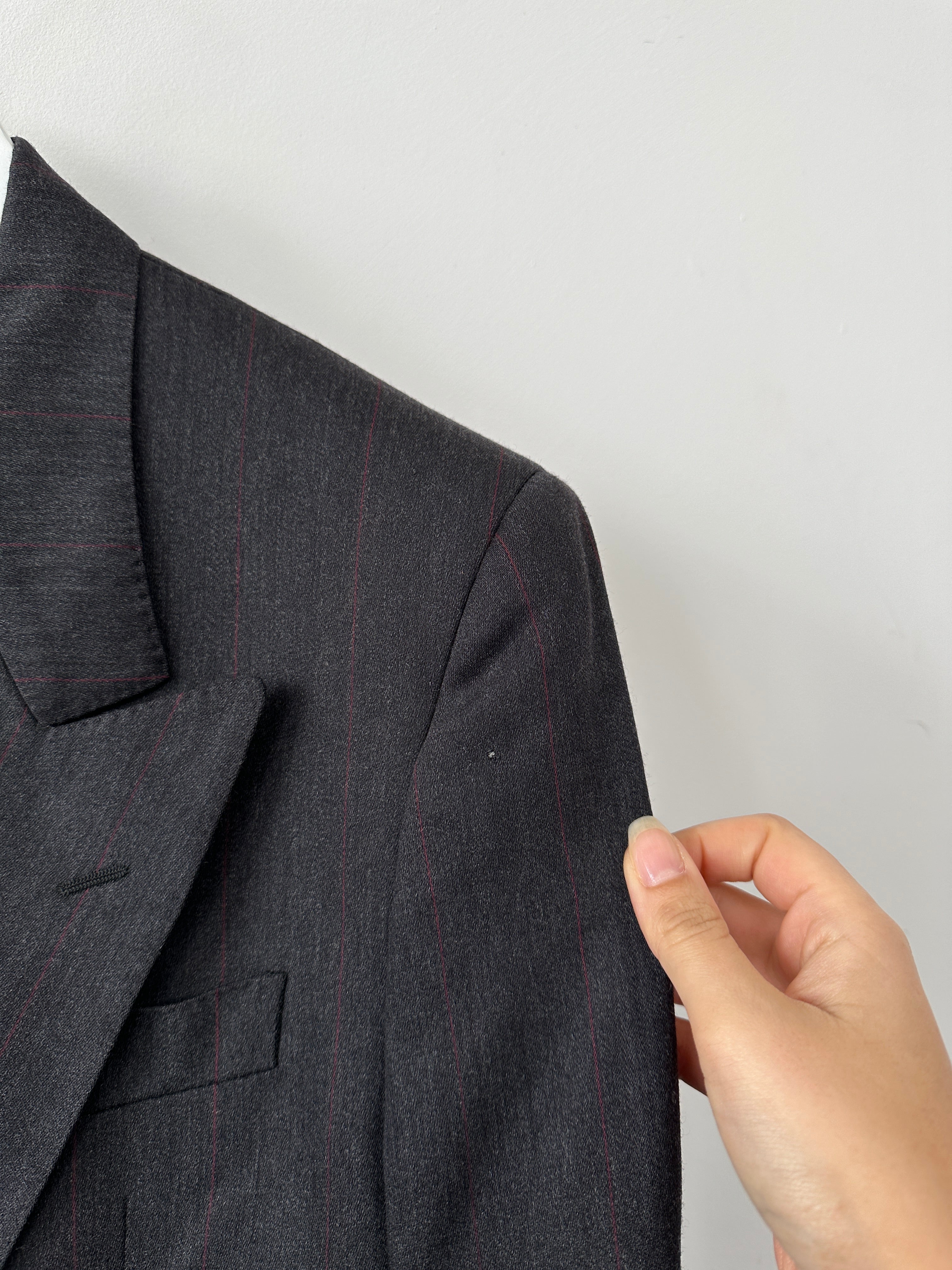 Valentino virgin wool double-breasted blazer in size 36R/S, tailored fit with classic lapels and button closure.