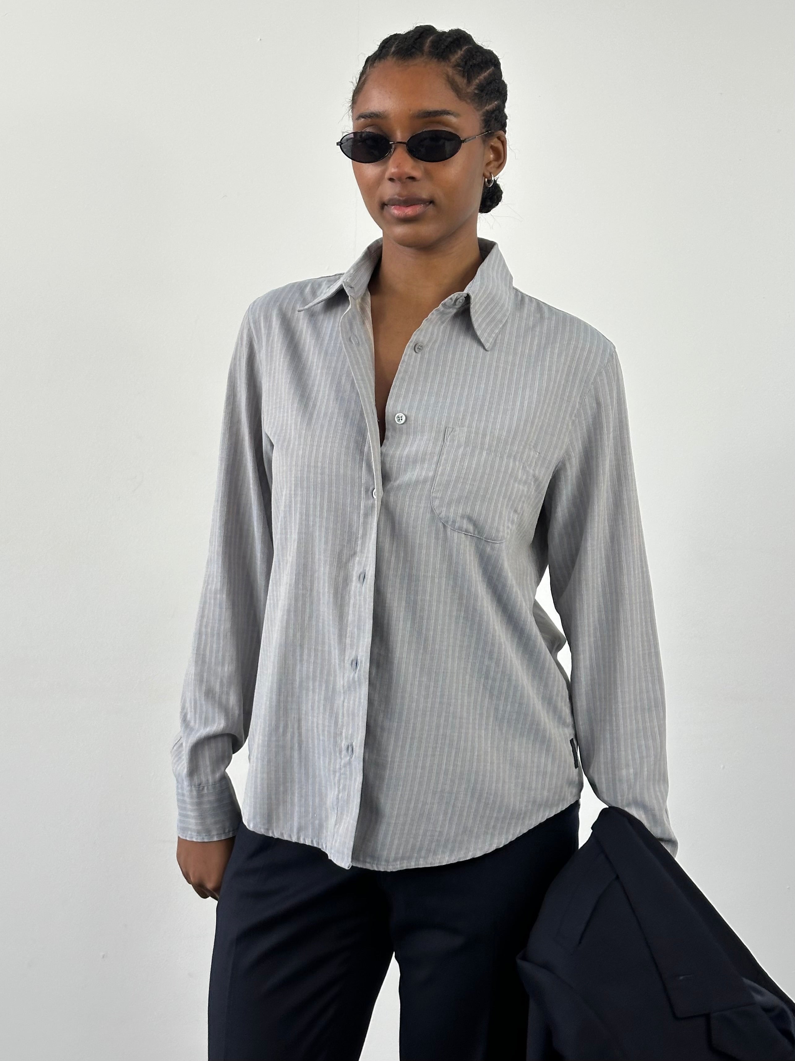 Armani Jeans 2000s stripe logo shirt in size M, featuring a classic striped design and the Armani logo on the chest.