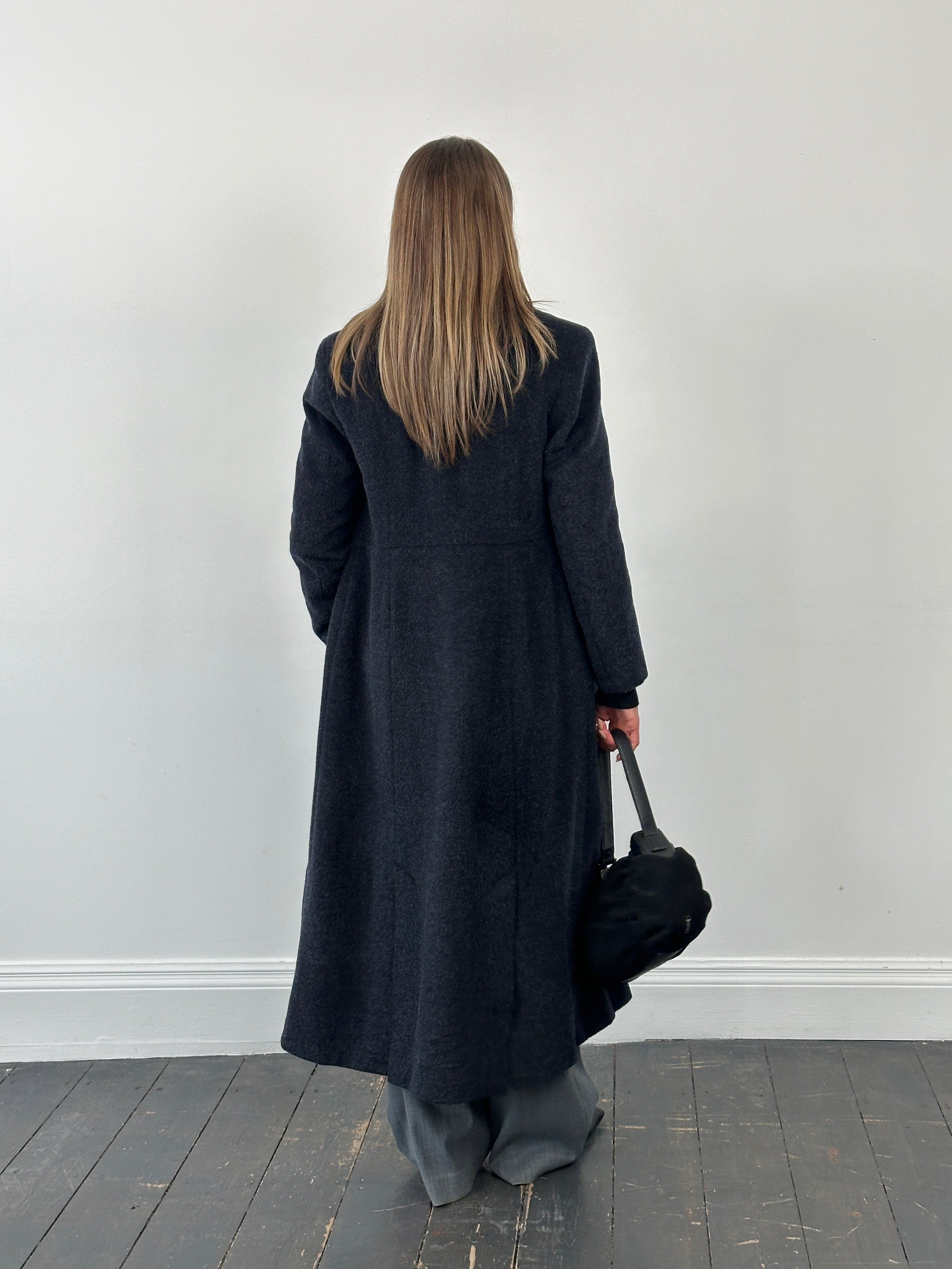 Vintage 1990s wool mohair double-breasted coat in size S/M, featuring classic style and textured fabric.