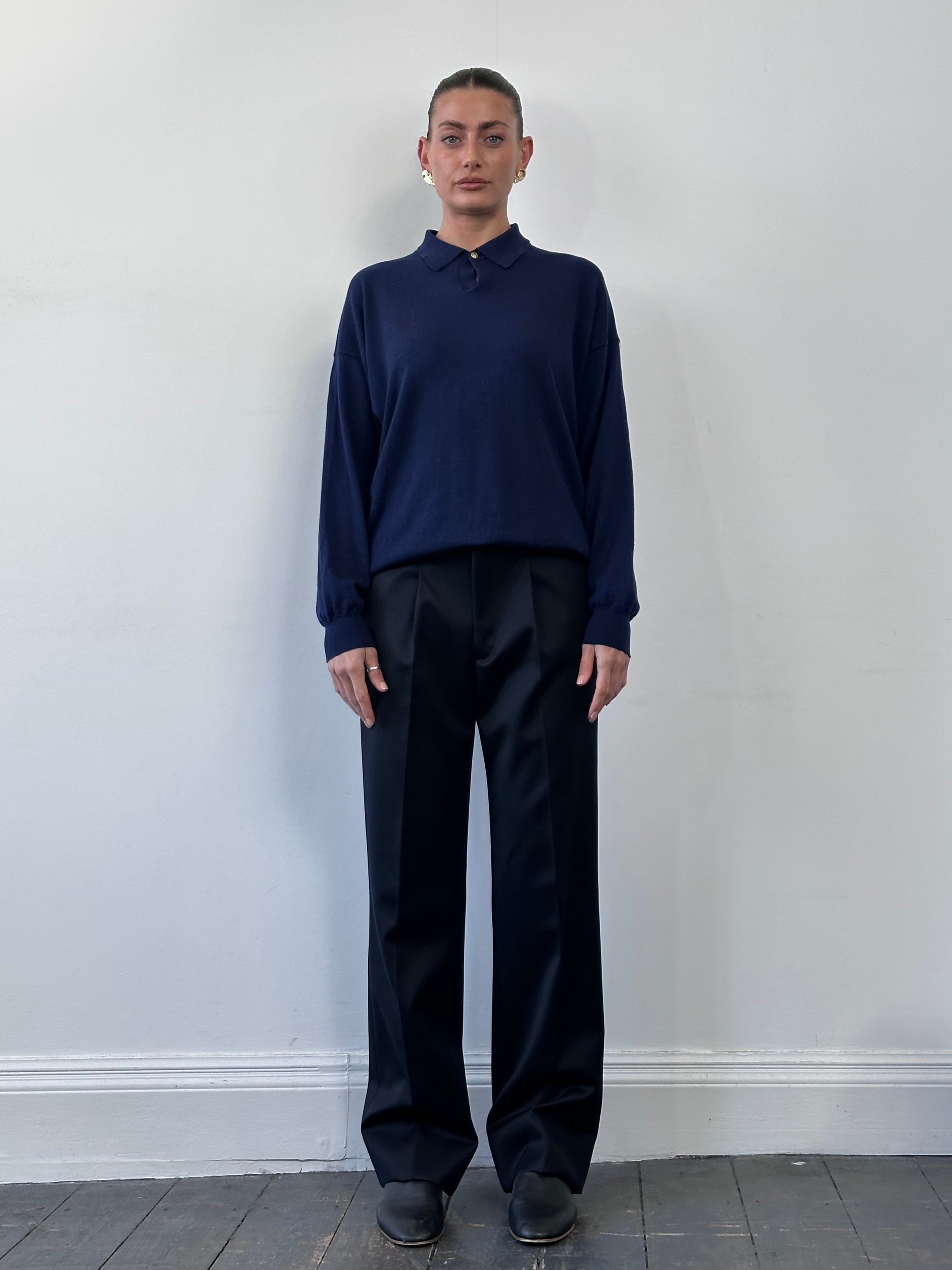 Italian vintage pure wool tailored trousers in W32, featuring classic fit and fine craftsmanship, shown on a neutral background.