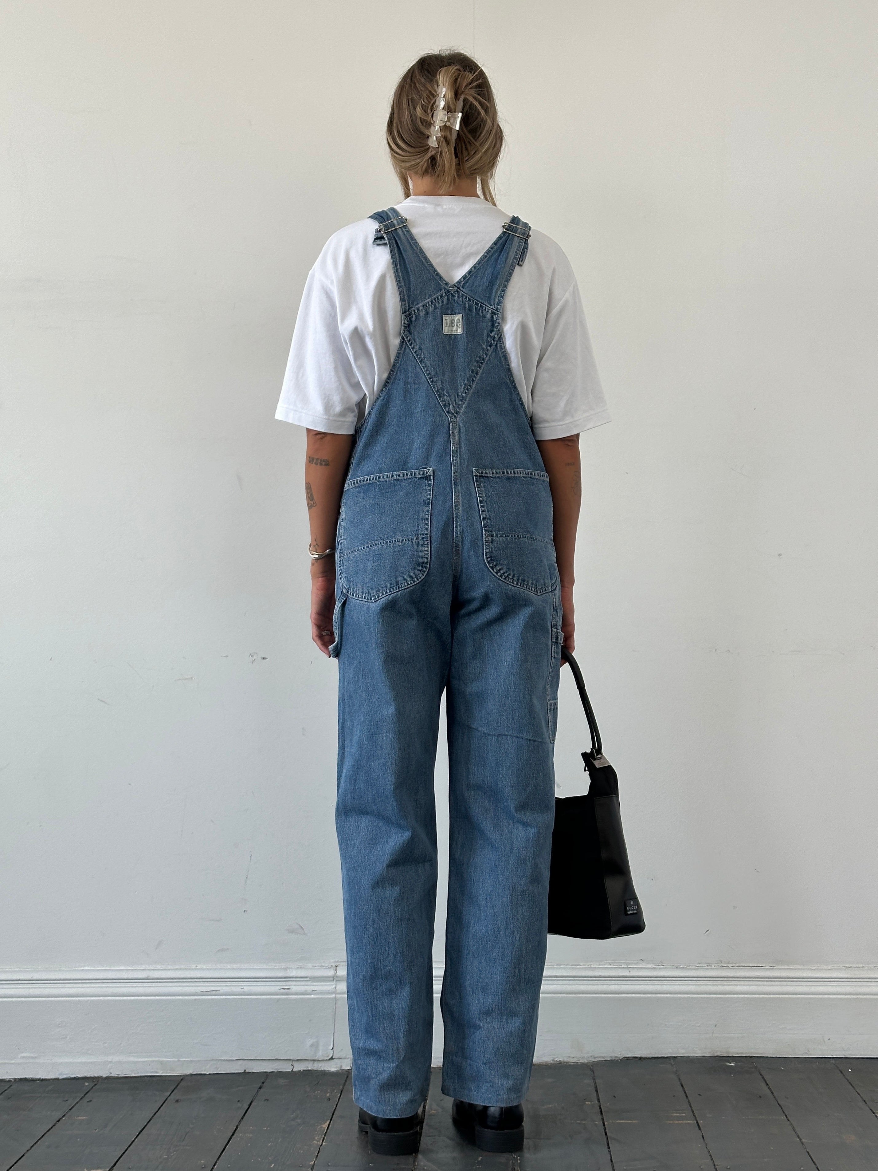 Lee Pure Cotton Denim Dungarees in size M, showcasing classic blue denim with adjustable shoulder straps and front pockets.
