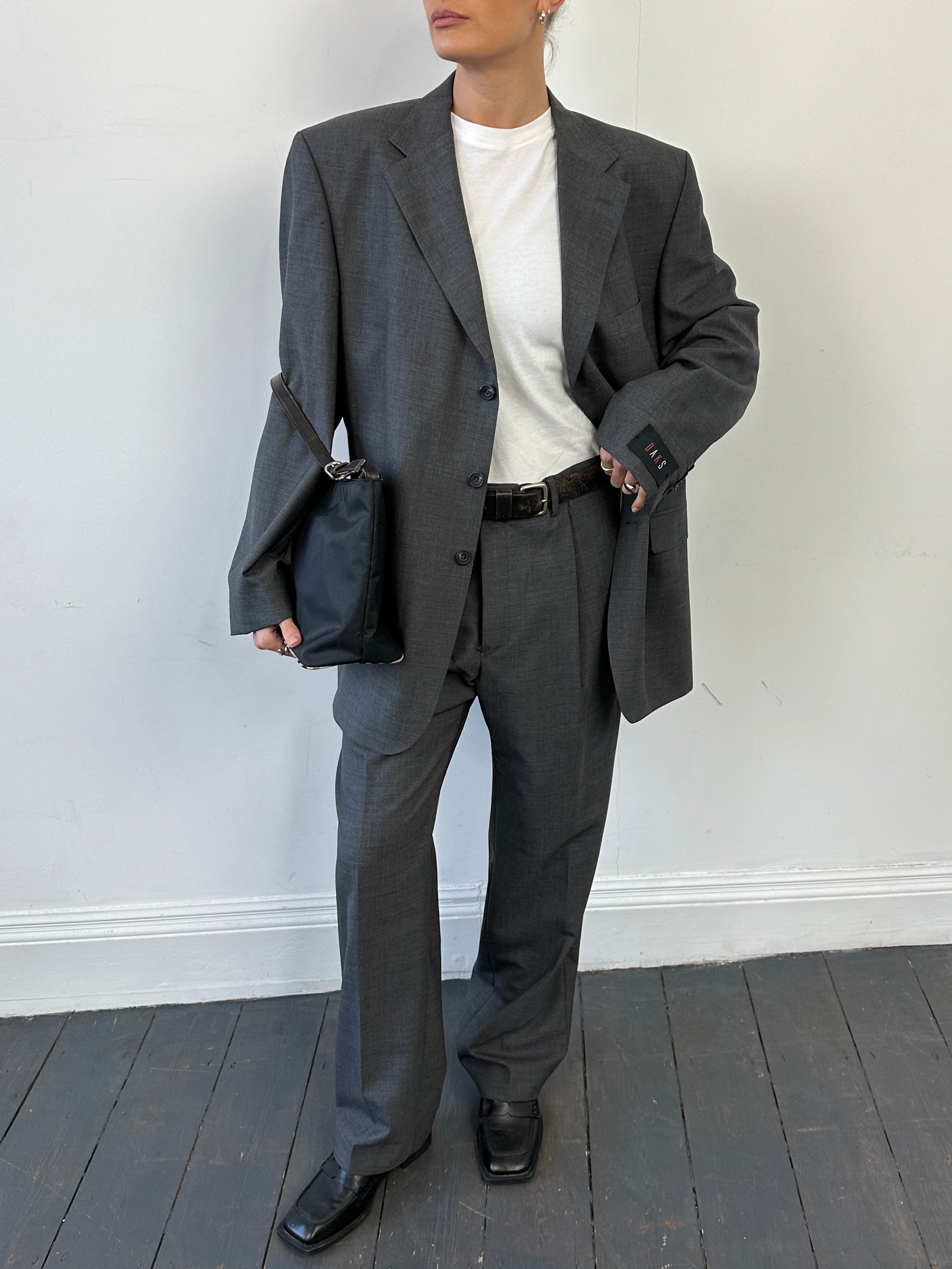 Vintage pure wool single-breasted suit jumpsuit in size 44R/W36, featuring classic tailoring and a vintage style.